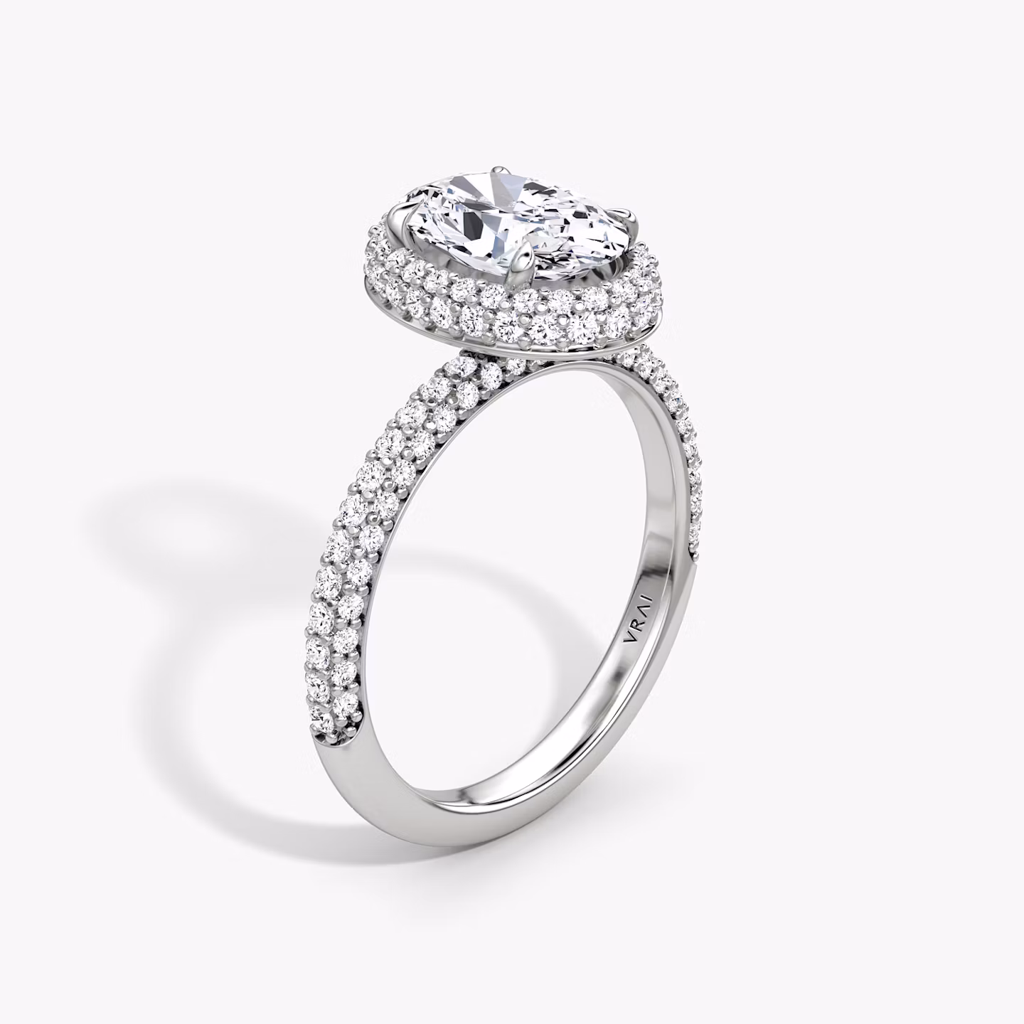 The Halo Dome | Oval | 18k | White Gold | bandAccent: Pavé | diamondOrientation: vertical | caratWeight: other