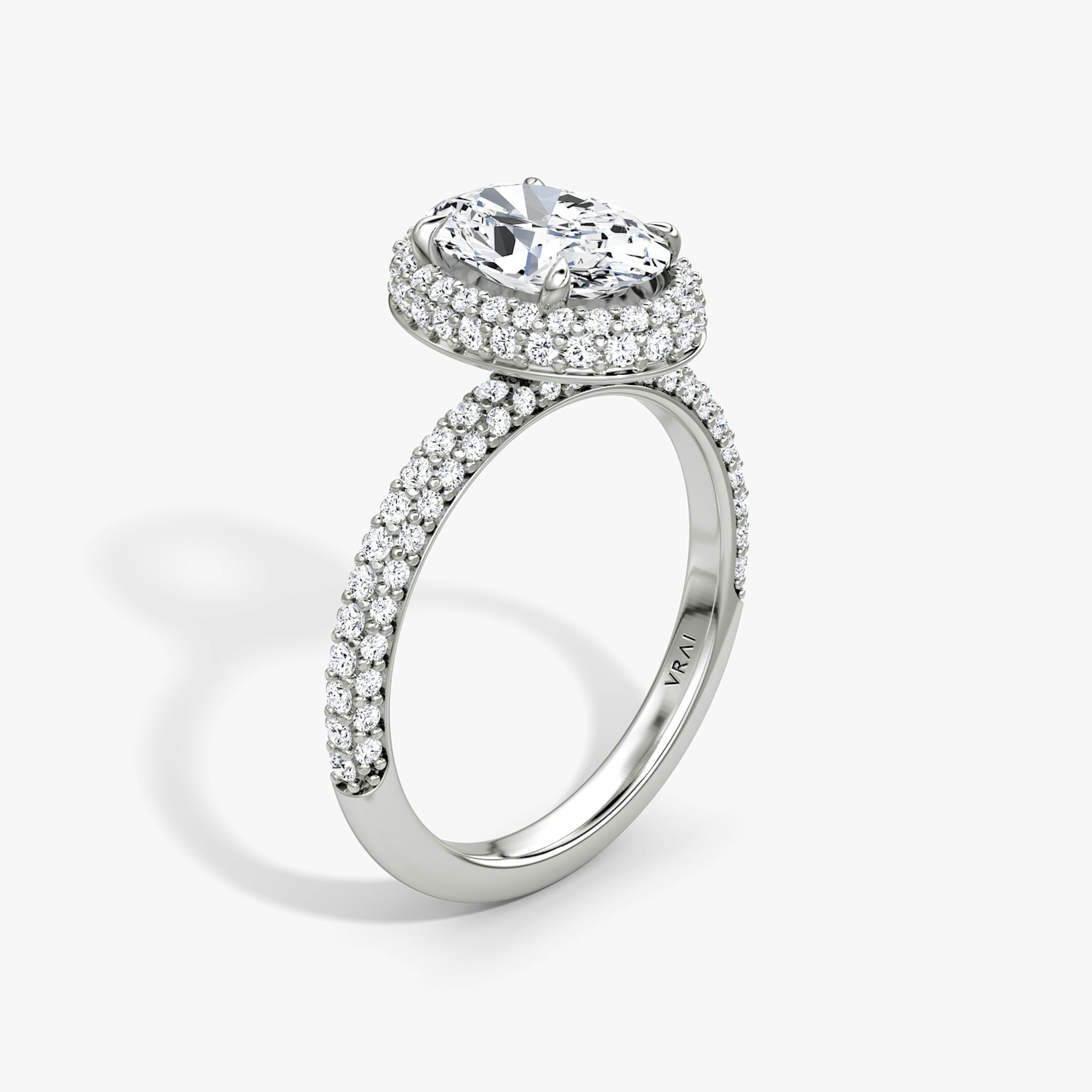 The Halo Dome | Oval | Platinum | bandAccent: Pavé | diamondOrientation: vertical | caratWeight: other