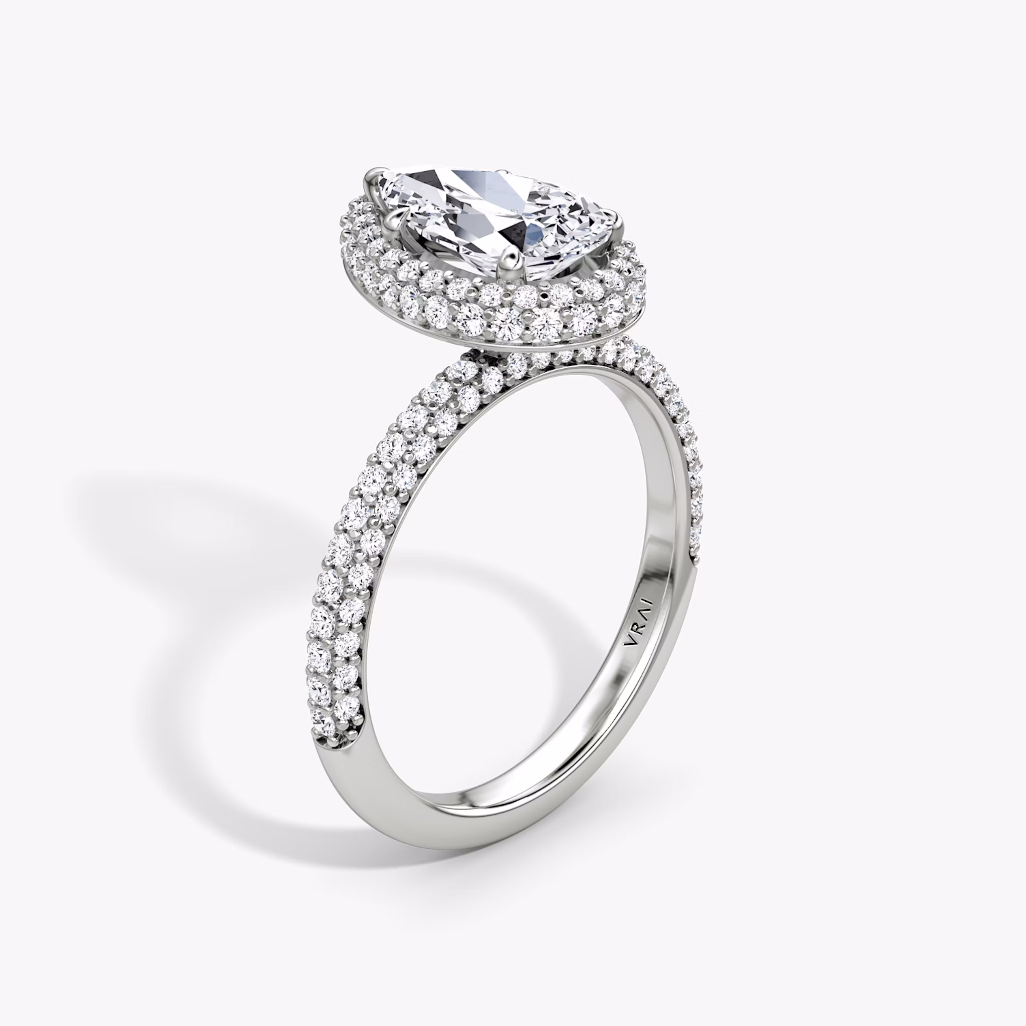 The Halo Dome | Pear | 18k | White Gold | bandAccent: Pavé | diamondOrientation: vertical | caratWeight: other