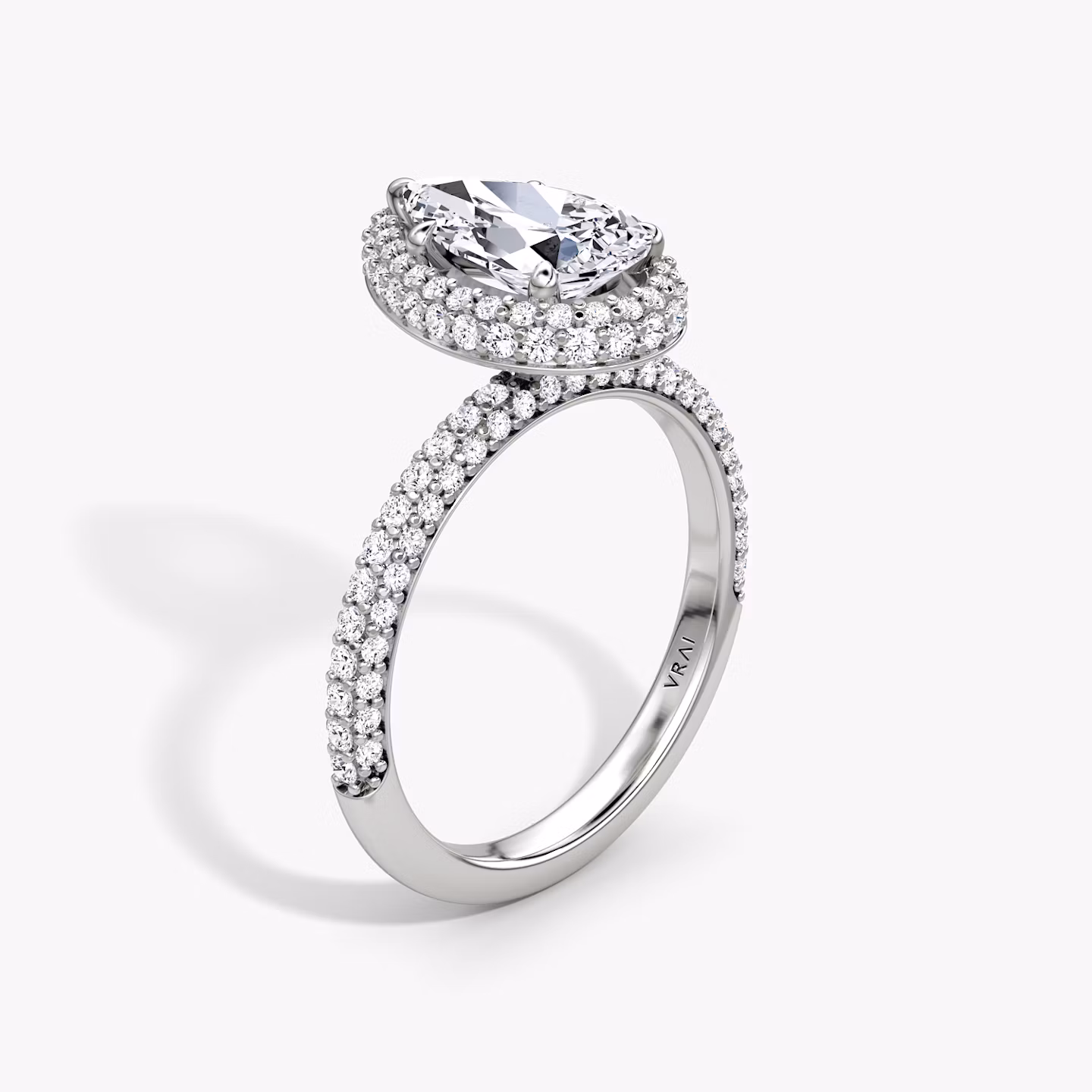 The Halo Dome | Pear | Platinum | bandAccent: Pavé | diamondOrientation: vertical | caratWeight: other