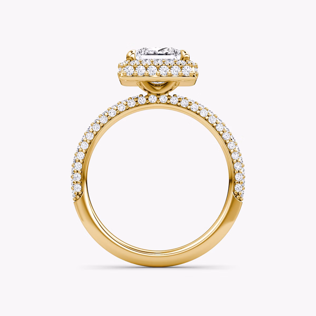 profile view of three-row dome halo engagement ring princess cut in pave yellow gold