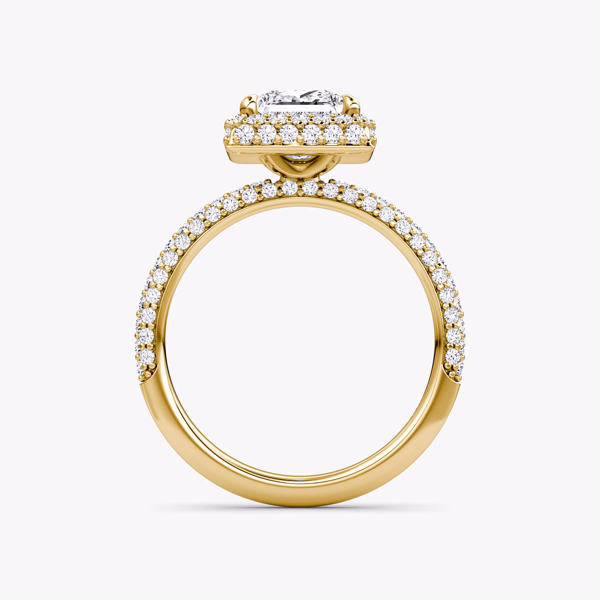 profile view of three-row dome halo engagement ring princess cut in pave yellow gold
