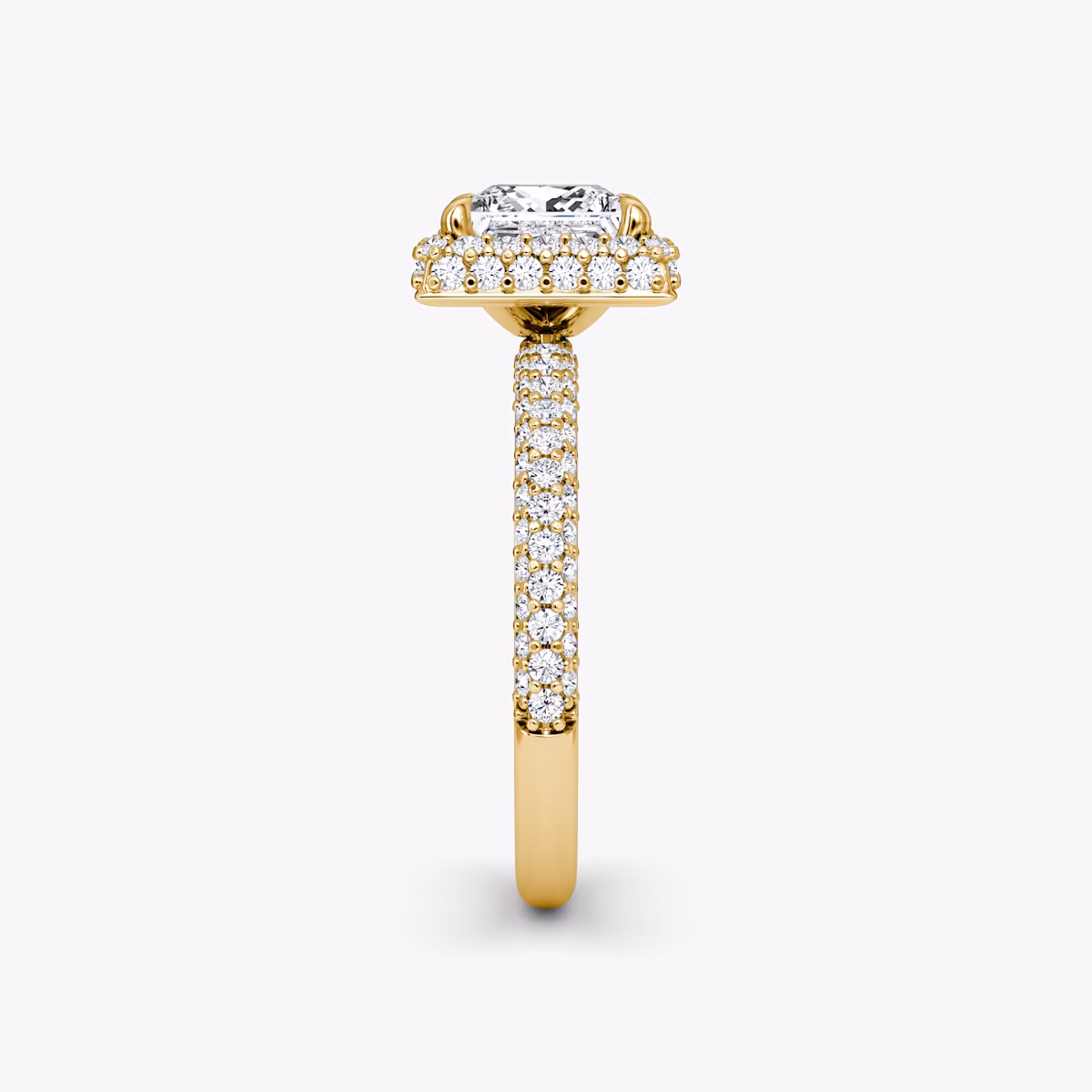 side view of three-row dome halo engagement ring princess cut in pave yellow gold