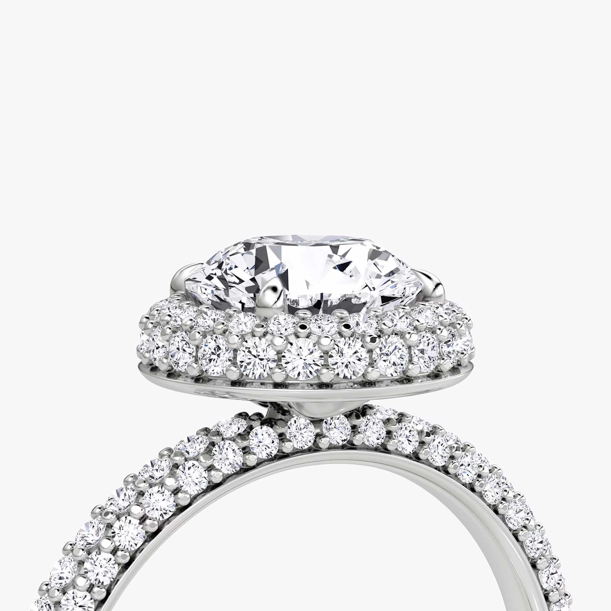 The Halo Dome | Round Brilliant | Platinum | bandAccent: Pavé | caratWeight: 1.0ct | diamondOrientation: vertical
