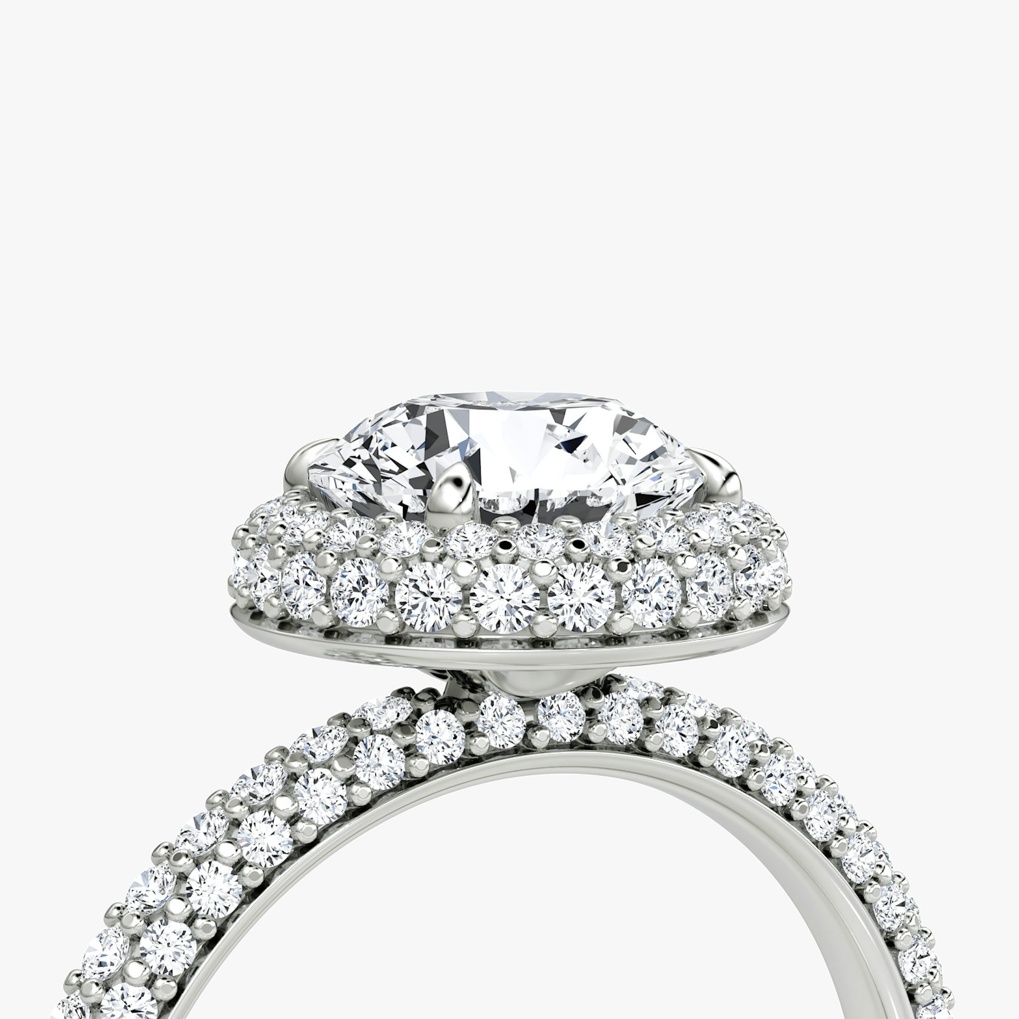 The Halo Dome | Round Brilliant | Platinum | bandAccent: Pavé | caratWeight: 1.0ct | diamondOrientation: vertical