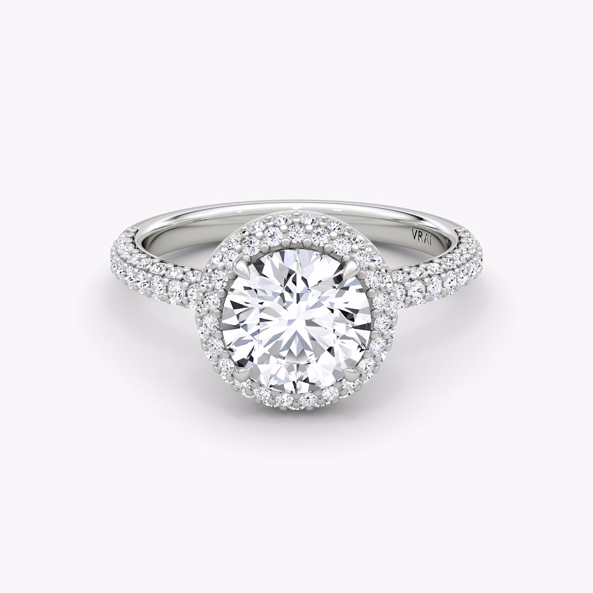 Double halo setting ring with two circles of pavé diamonds