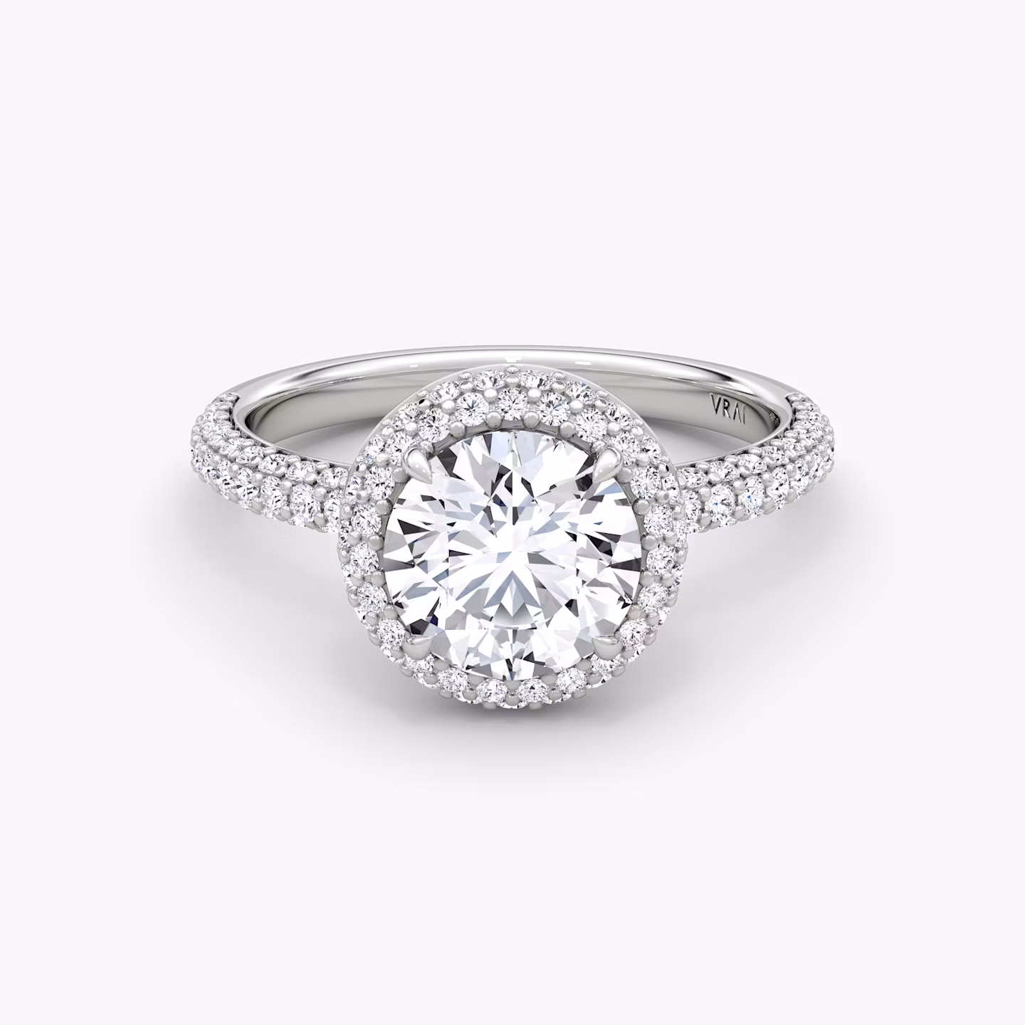 Double halo setting ring with two circles of pavé diamonds