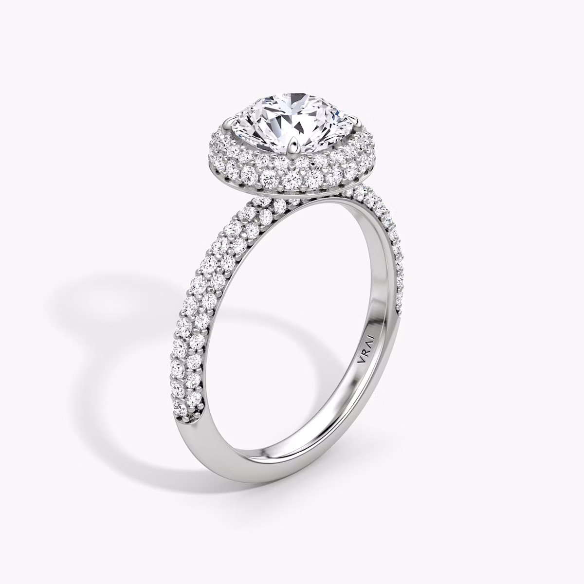 The Halo Dome | Round Brilliant | 18k | White Gold | bandAccent: Pavé | caratWeight: other | diamondOrientation: vertical