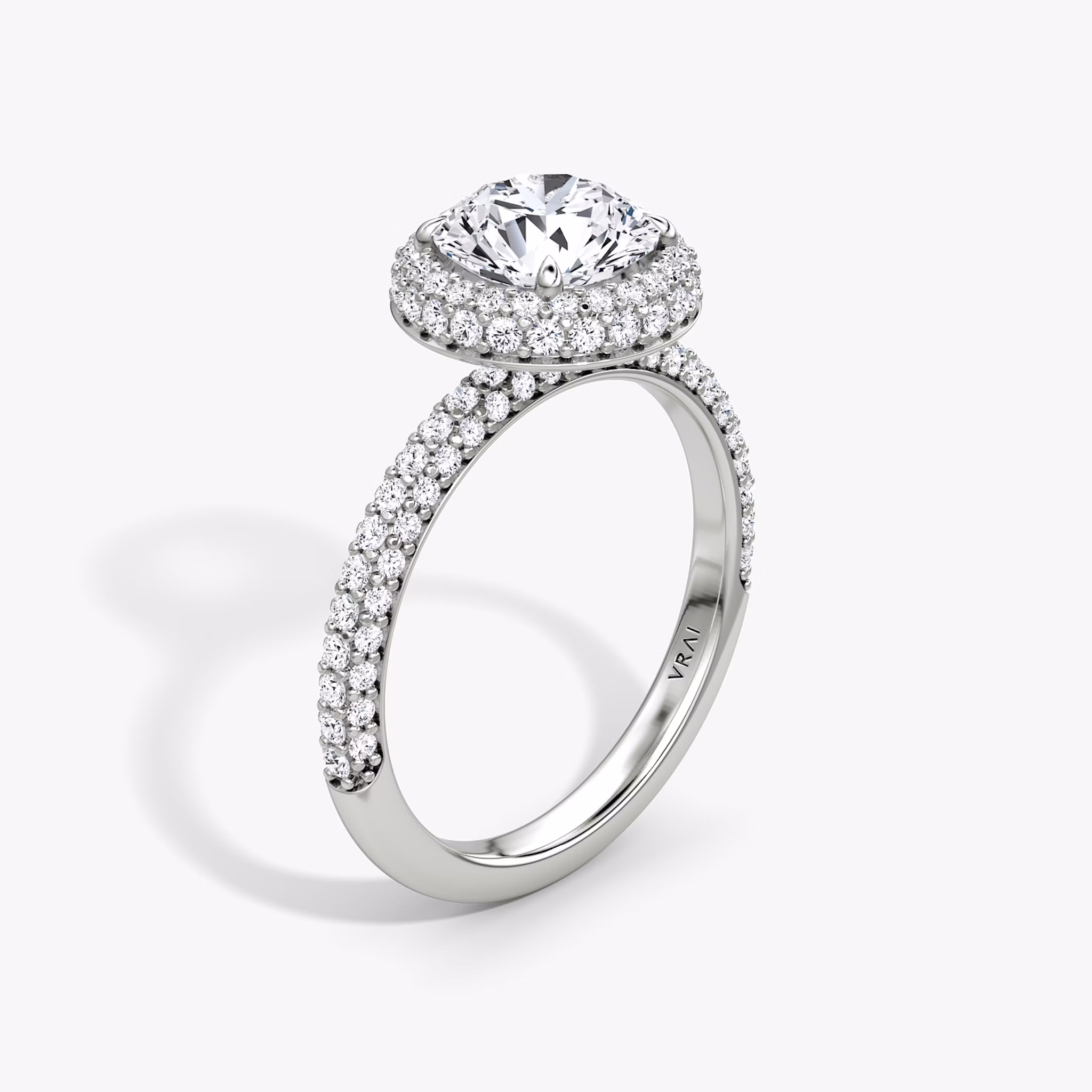 The Halo Dome | Round Brilliant | Platinum | bandAccent: Pavé | caratWeight: 1.0ct | diamondOrientation: vertical