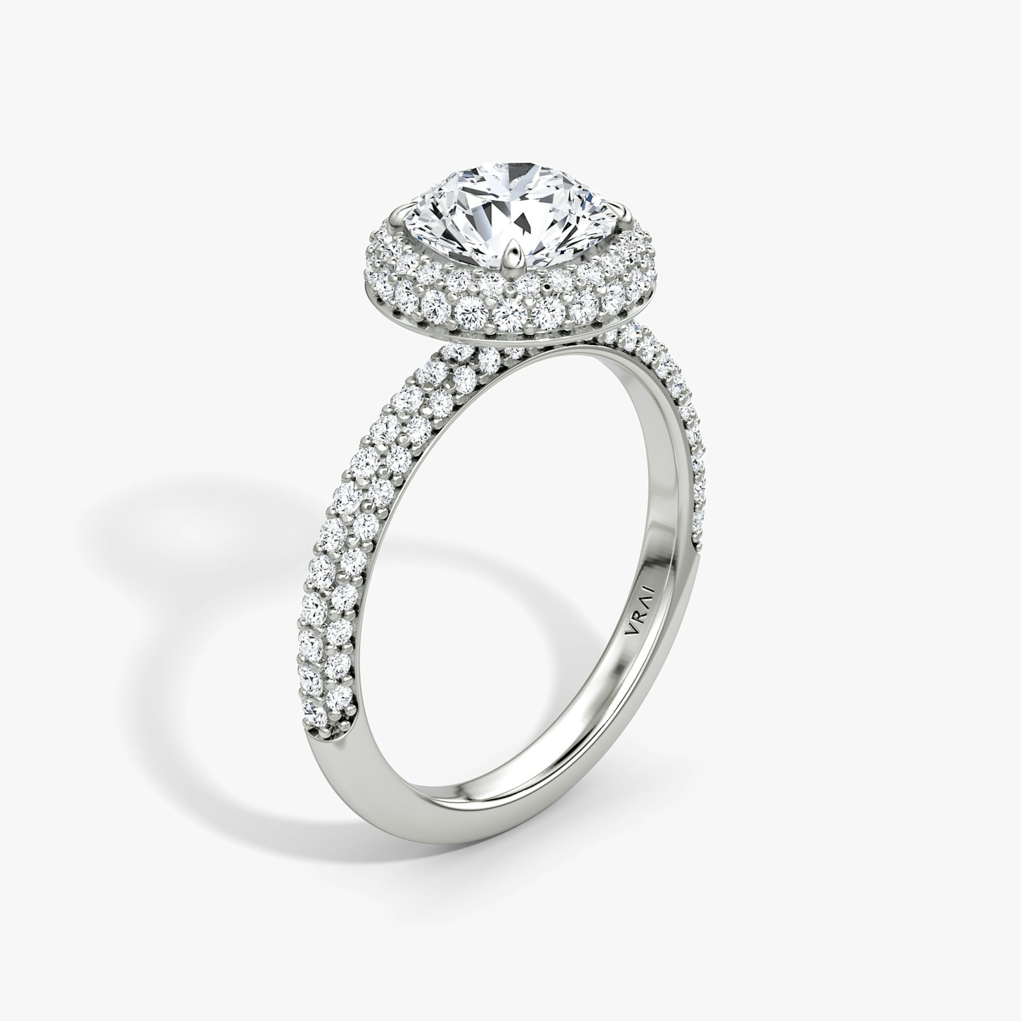 The Halo Dome | Round Brilliant | Platinum | bandAccent: Pavé | caratWeight: 1.0ct | diamondOrientation: vertical