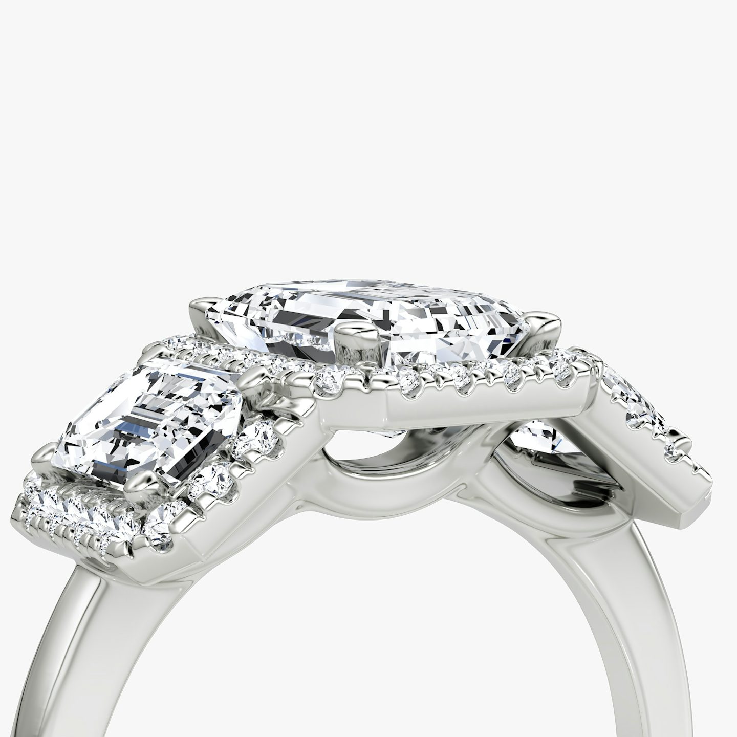 The Three Stone Halo | Emerald | 18k | White Gold | bandAccent: Plain | sideStoneCarat: 0.50ct | diamondOrientation: vertical | caratWeight: other