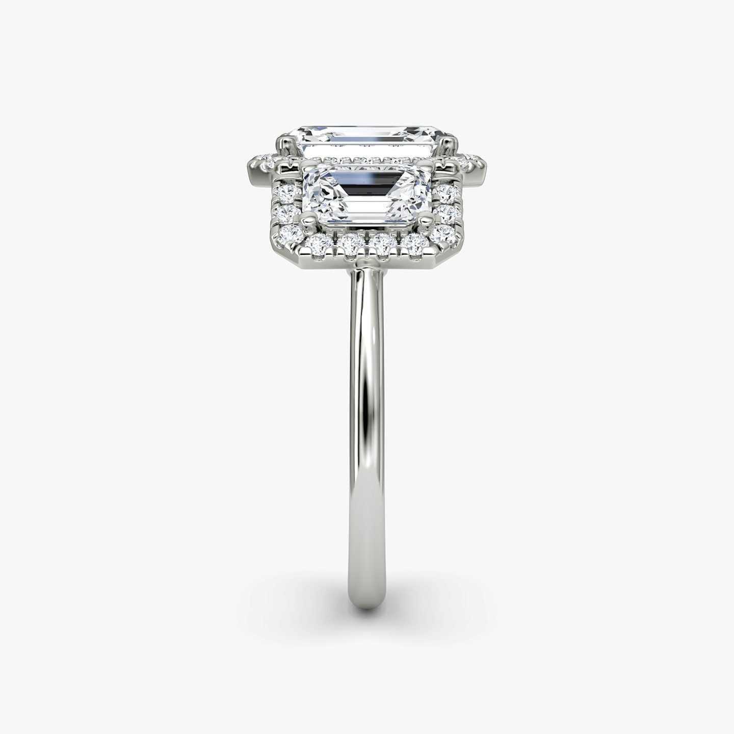The Three Stone Halo | Emerald | 18k | White Gold | bandAccent: Plain | sideStoneCarat: 0.50ct | diamondOrientation: vertical | caratWeight: other