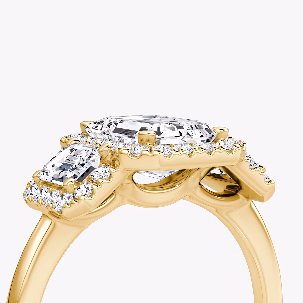 The Three Stone Halo | Emerald | 18k | Yellow Gold | bandAccent: Plain | sideStoneCarat: 0.25ct | diamondOrientation: vertical | caratWeight: other