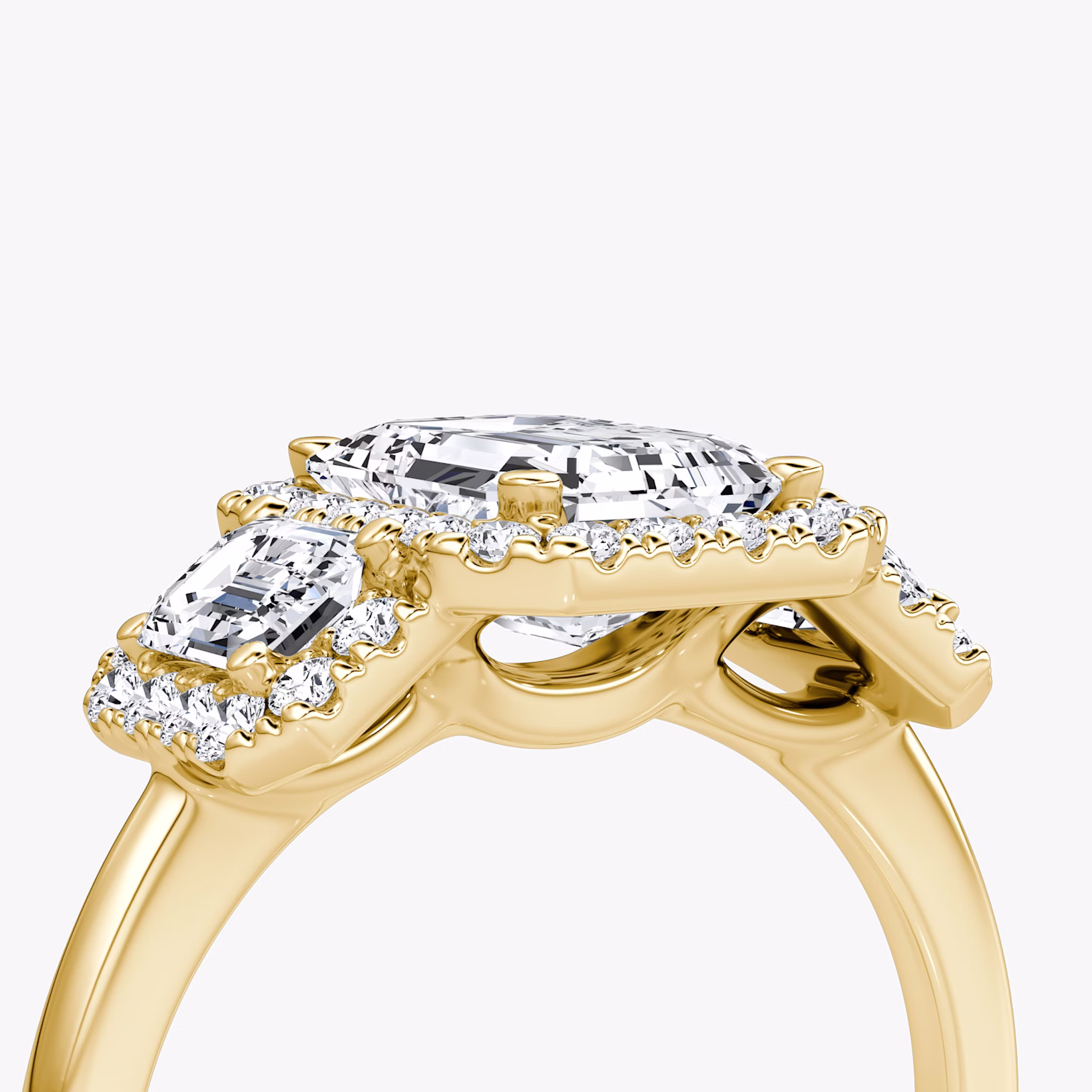 The Three Stone Halo | Emerald | 18k | Yellow Gold | bandAccent: Plain | sideStoneCarat: 0.25ct | diamondOrientation: vertical | caratWeight: other