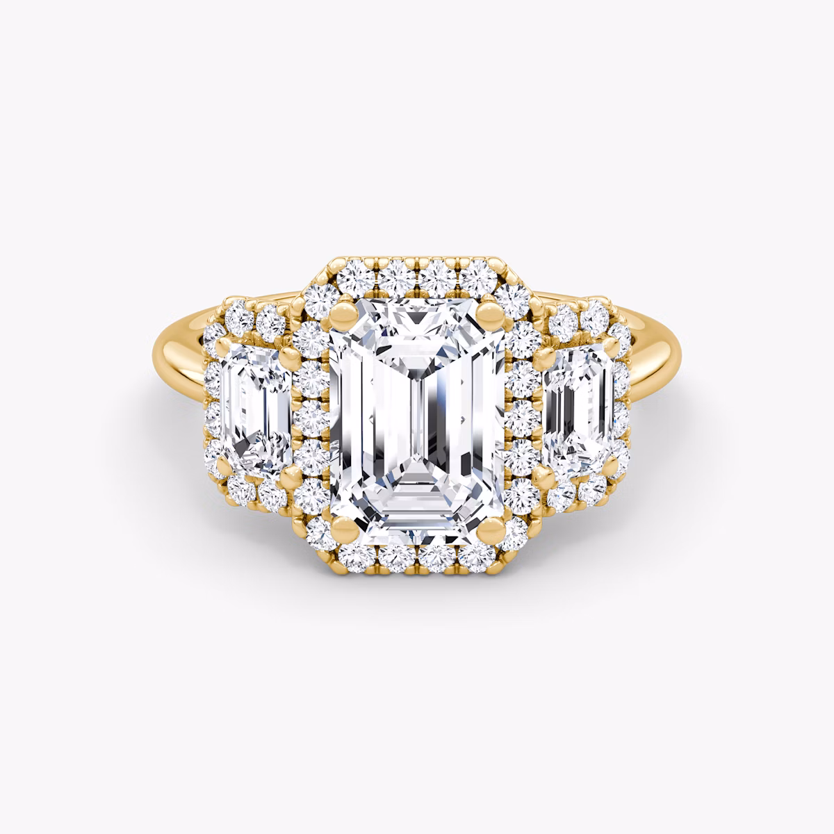 The Three Stone Halo | Emerald | 18k | Yellow Gold | bandAccent: Plain | sideStoneCarat: 0.25ct | diamondOrientation: vertical | caratWeight: other