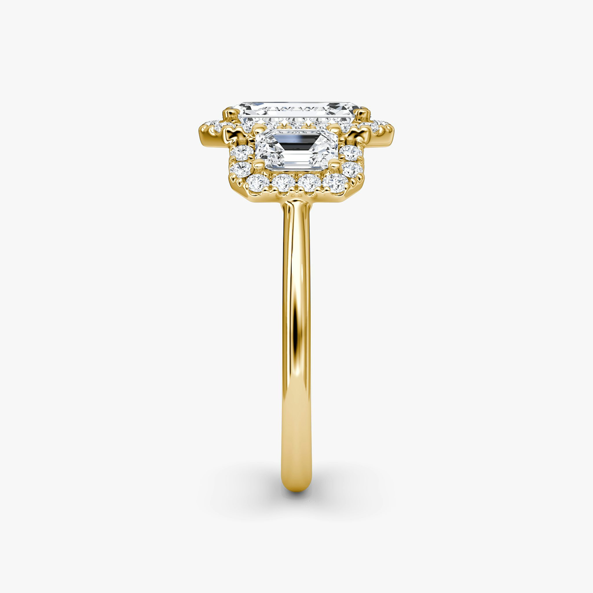 The Three Stone Halo | Emerald | 18k | Yellow Gold | bandAccent: Plain | sideStoneCarat: 0.25ct | diamondOrientation: vertical | caratWeight: other