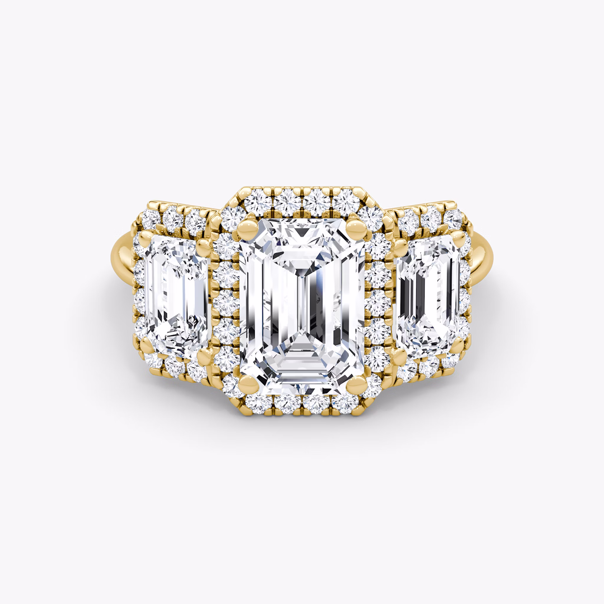 The Three Stone Halo | Emerald | 18k | Yellow Gold | bandAccent: Plain | sideStoneCarat: 0.50ct | diamondOrientation: vertical | caratWeight: other