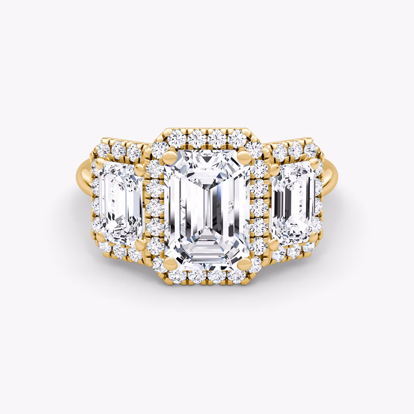 The Three Stone Halo | Emerald | 18k | Yellow Gold | bandAccent: Plain | sideStoneCarat: 0.50ct | diamondOrientation: vertical | caratWeight: other