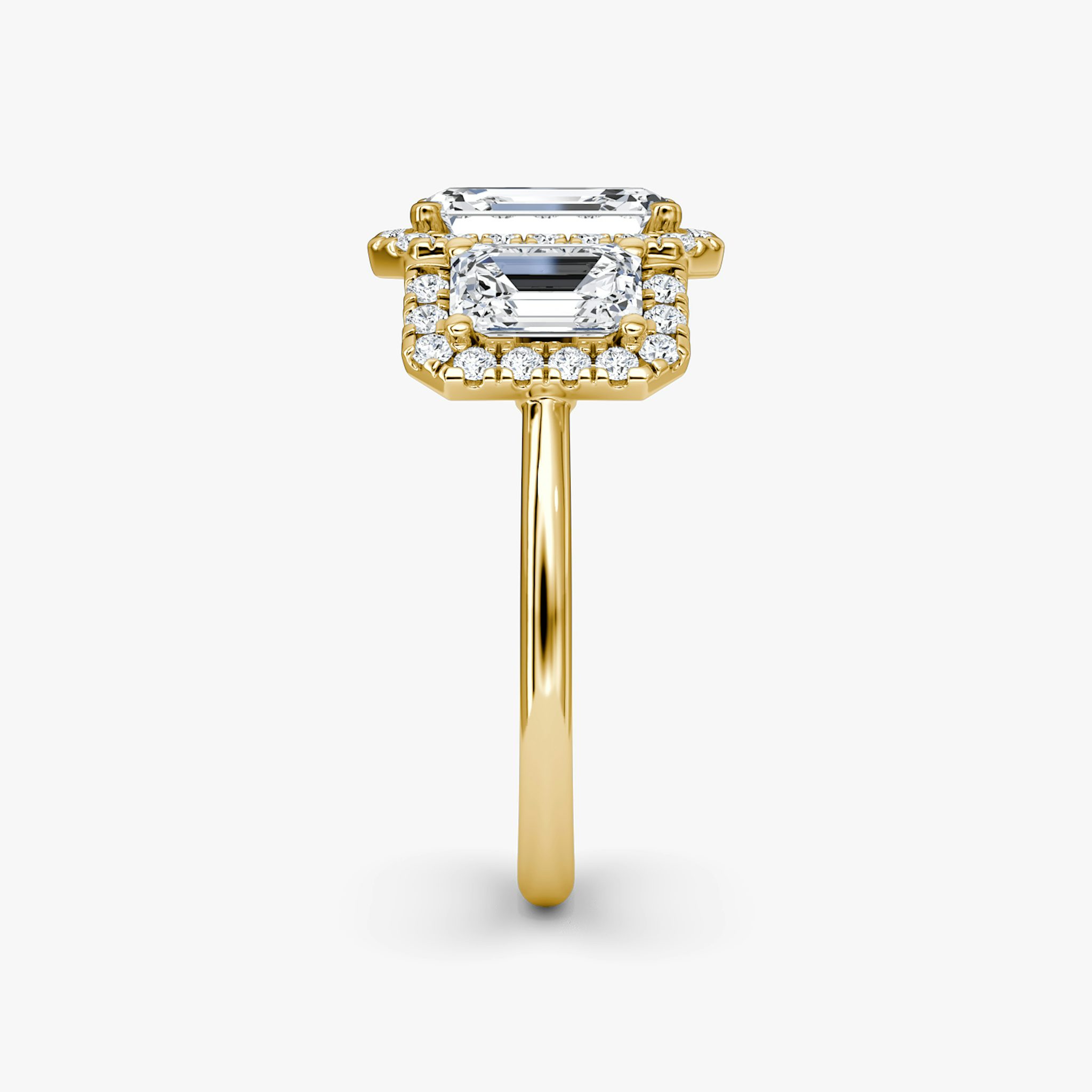 The Three Stone Halo | Emerald | 18k | Yellow Gold | bandAccent: Plain | sideStoneCarat: 0.50ct | diamondOrientation: vertical | caratWeight: other