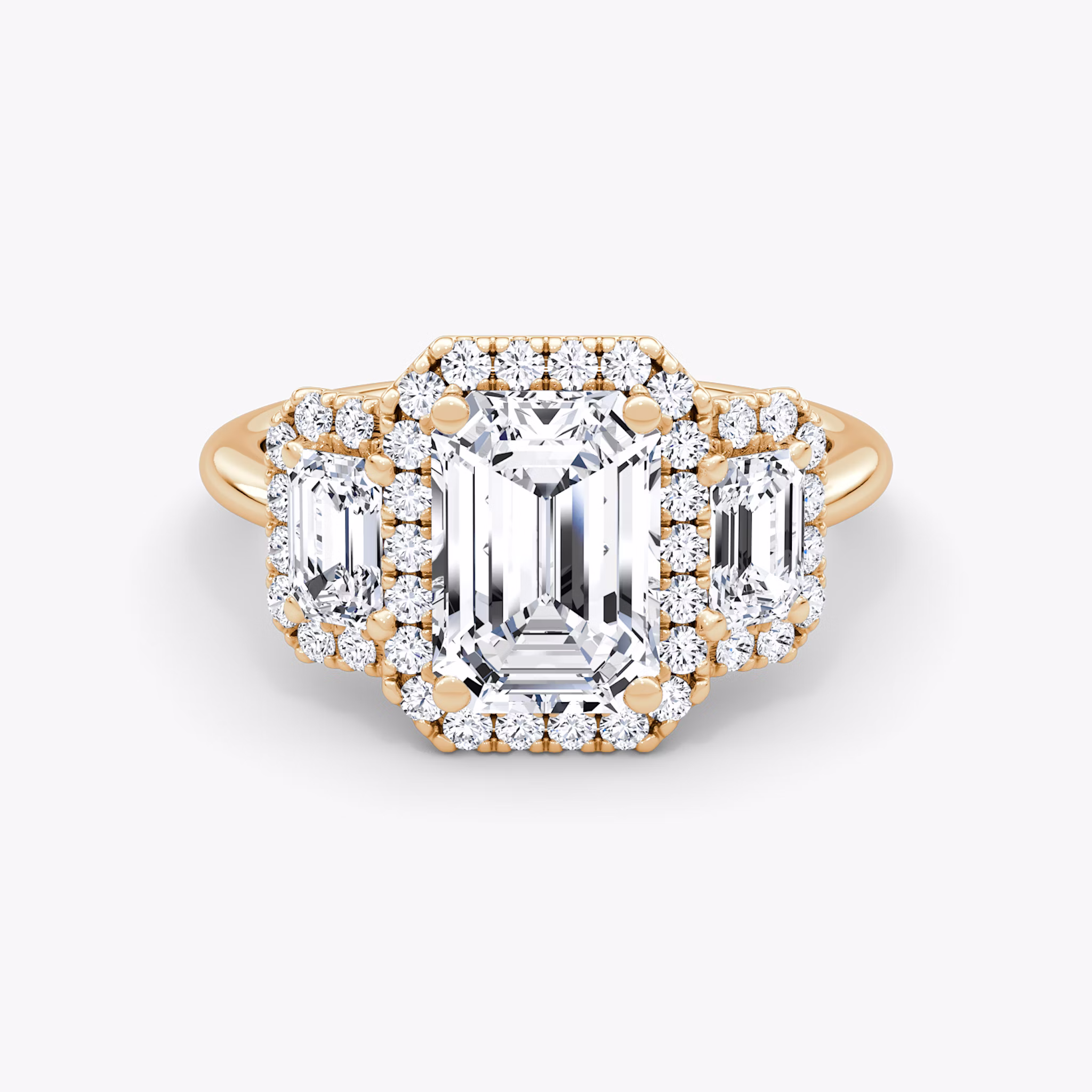 The Three Stone Halo | Emerald | 14k | Rose Gold | bandAccent: Plain | sideStoneCarat: 0.25ct | diamondOrientation: vertical | caratWeight: other