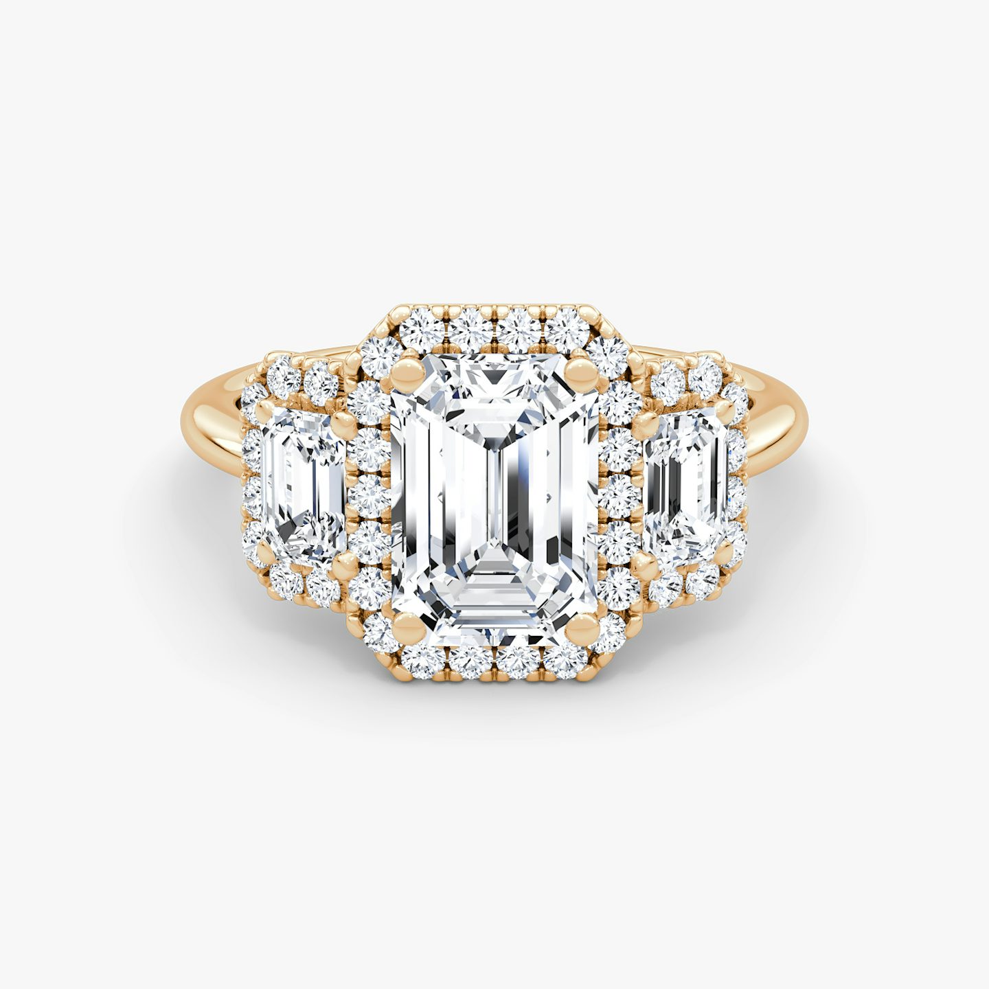 The Three Stone Halo | Emerald | 14k | Rose Gold | bandAccent: Plain | sideStoneCarat: 0.25ct | diamondOrientation: vertical | caratWeight: other
