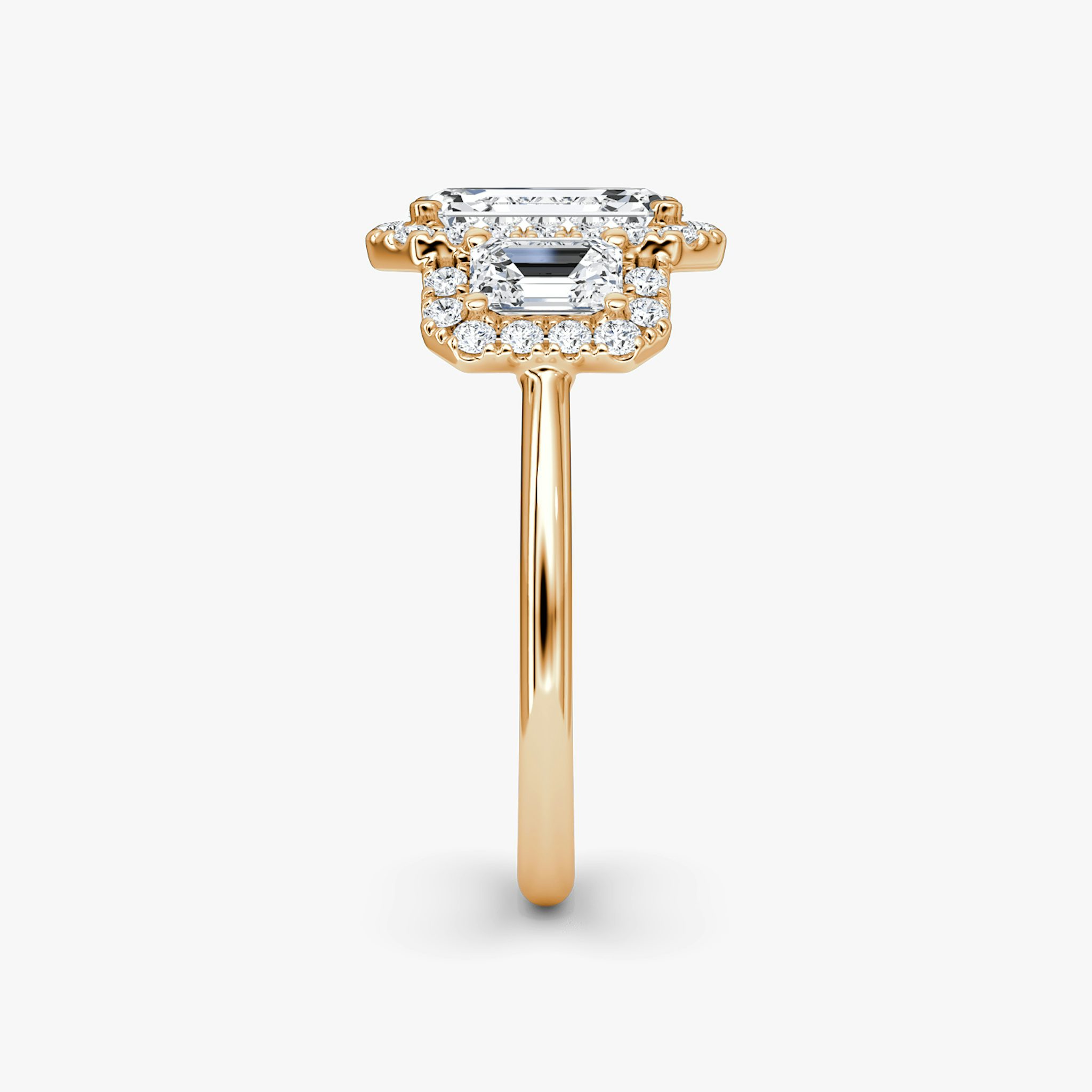 The Three Stone Halo | Emerald | 14k | Rose Gold | bandAccent: Plain | sideStoneCarat: 0.25ct | diamondOrientation: vertical | caratWeight: other