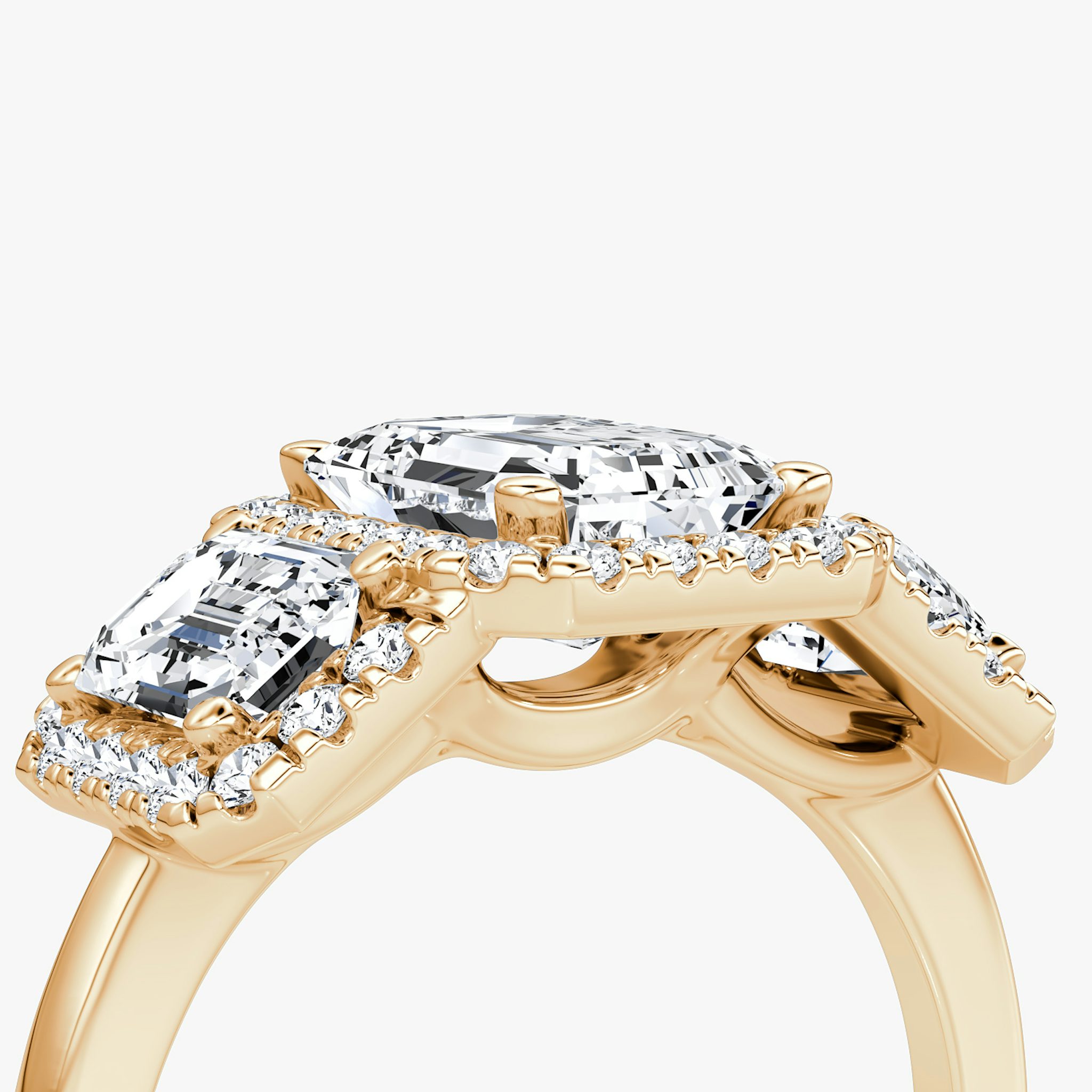 The Three Stone Halo | Emerald | 14k | Rose Gold | bandAccent: Plain | sideStoneCarat: 0.50ct | diamondOrientation: vertical | caratWeight: other