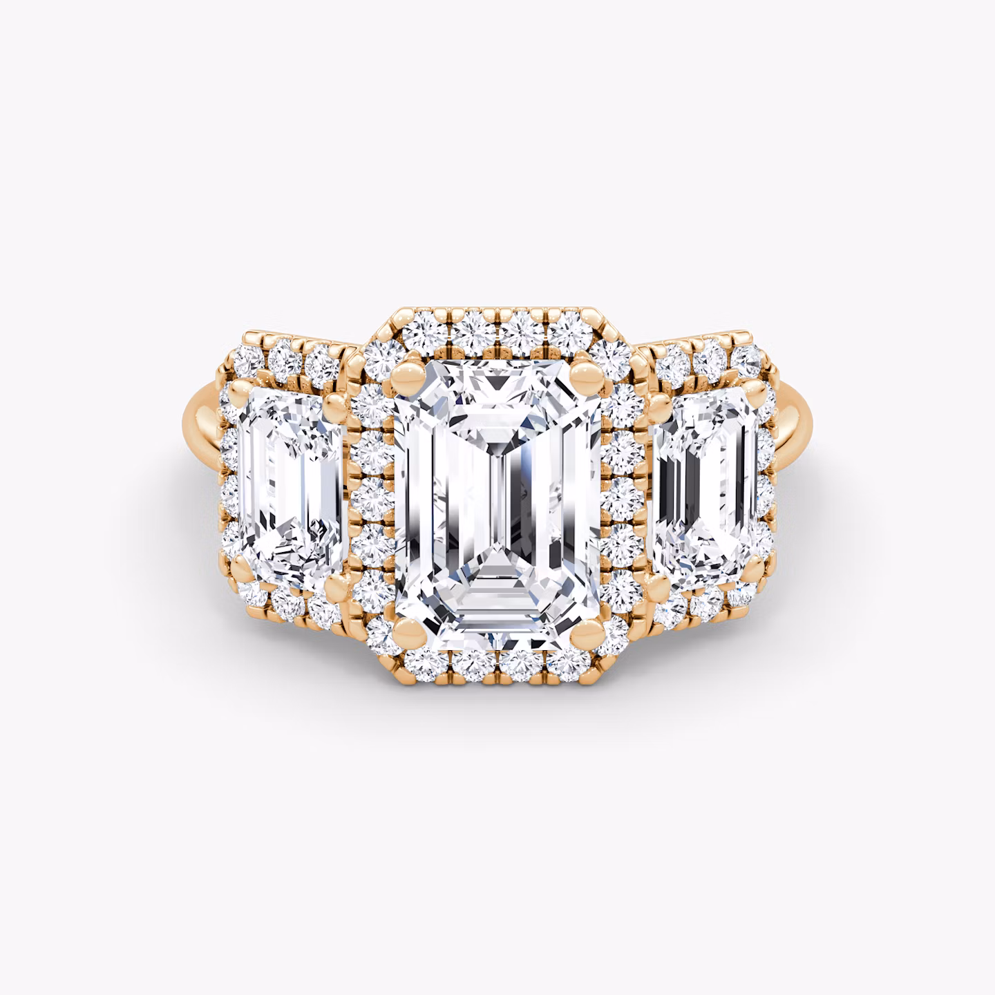 The Three Stone Halo | Emerald | 14k | Rose Gold | bandAccent: Plain | sideStoneCarat: 0.50ct | diamondOrientation: vertical | caratWeight: other