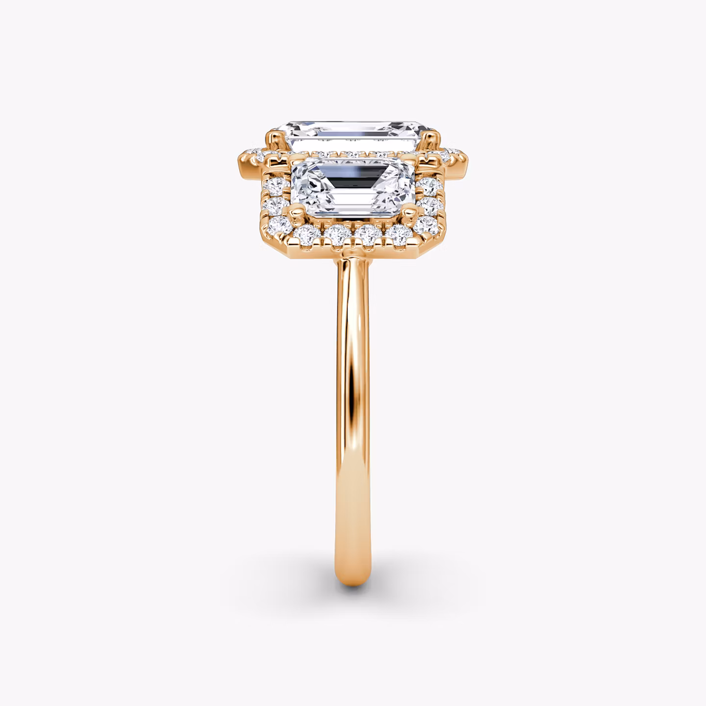 The Three Stone Halo | Emerald | 14k | Rose Gold | bandAccent: Plain | sideStoneCarat: 0.50ct | diamondOrientation: vertical | caratWeight: other