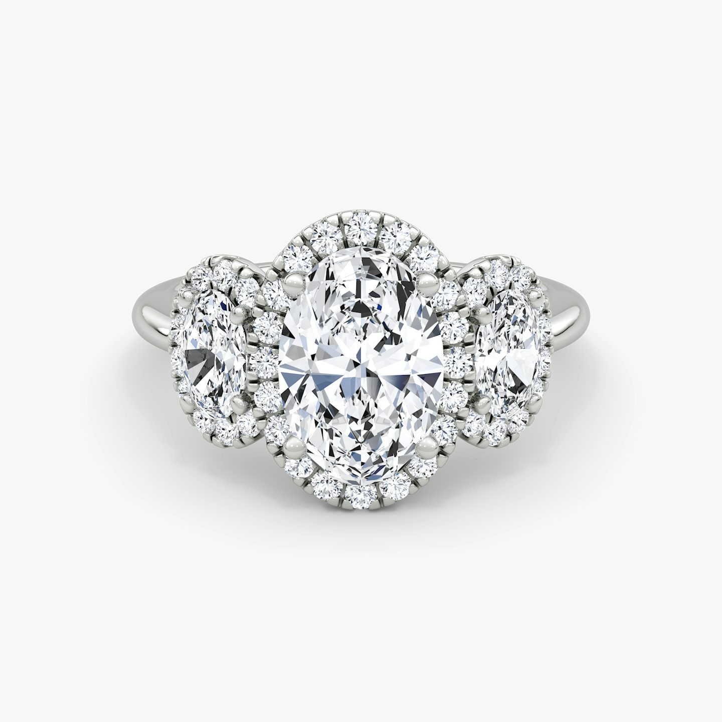 The Three Stone Halo | Oval | 18k | White Gold | bandAccent: Plain | sideStoneCarat: 0.25ct | diamondOrientation: vertical | caratWeight: other