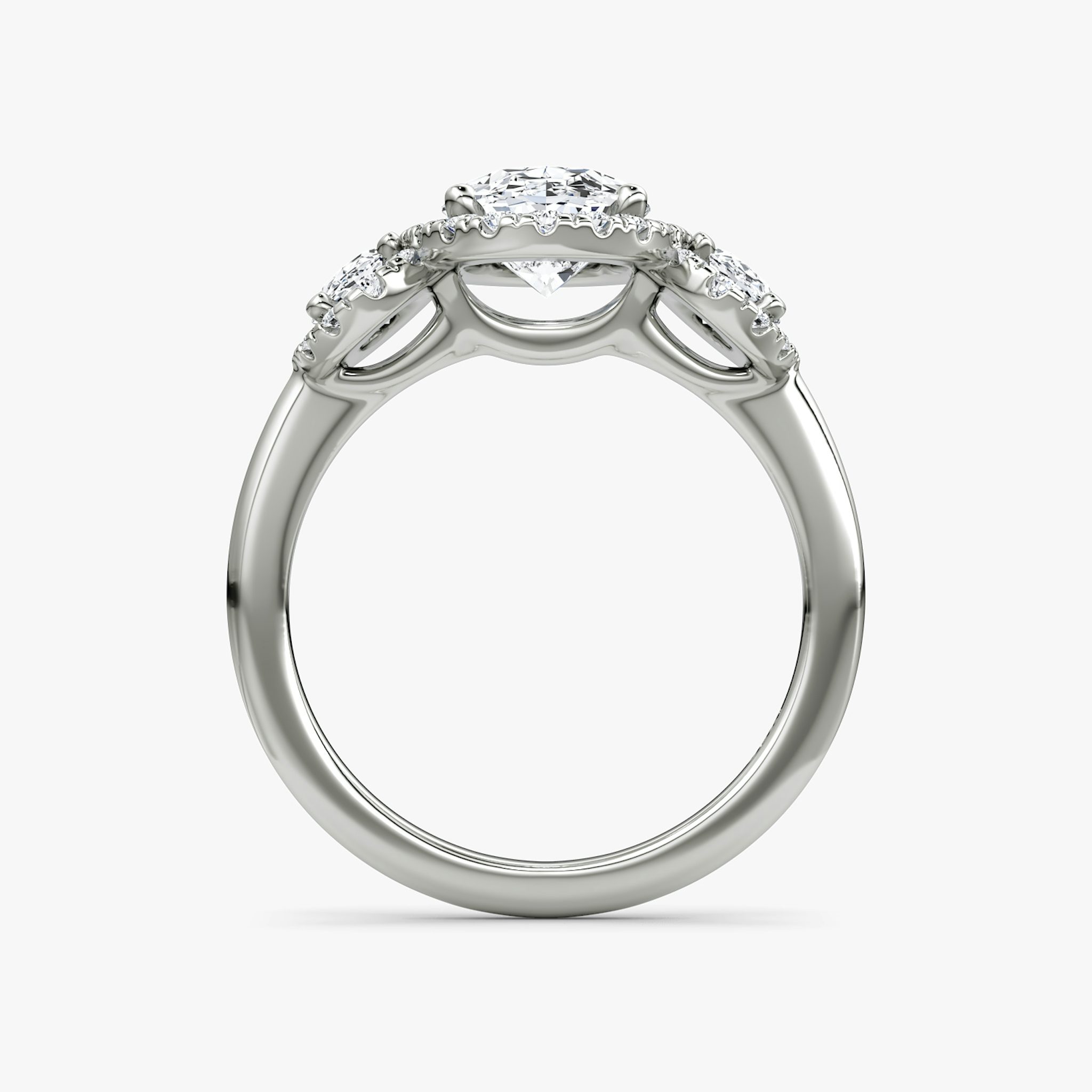 The Three Stone Halo | Oval | Platinum | bandAccent: Plain | sideStoneCarat: 0.25ct | diamondOrientation: vertical | caratWeight: other