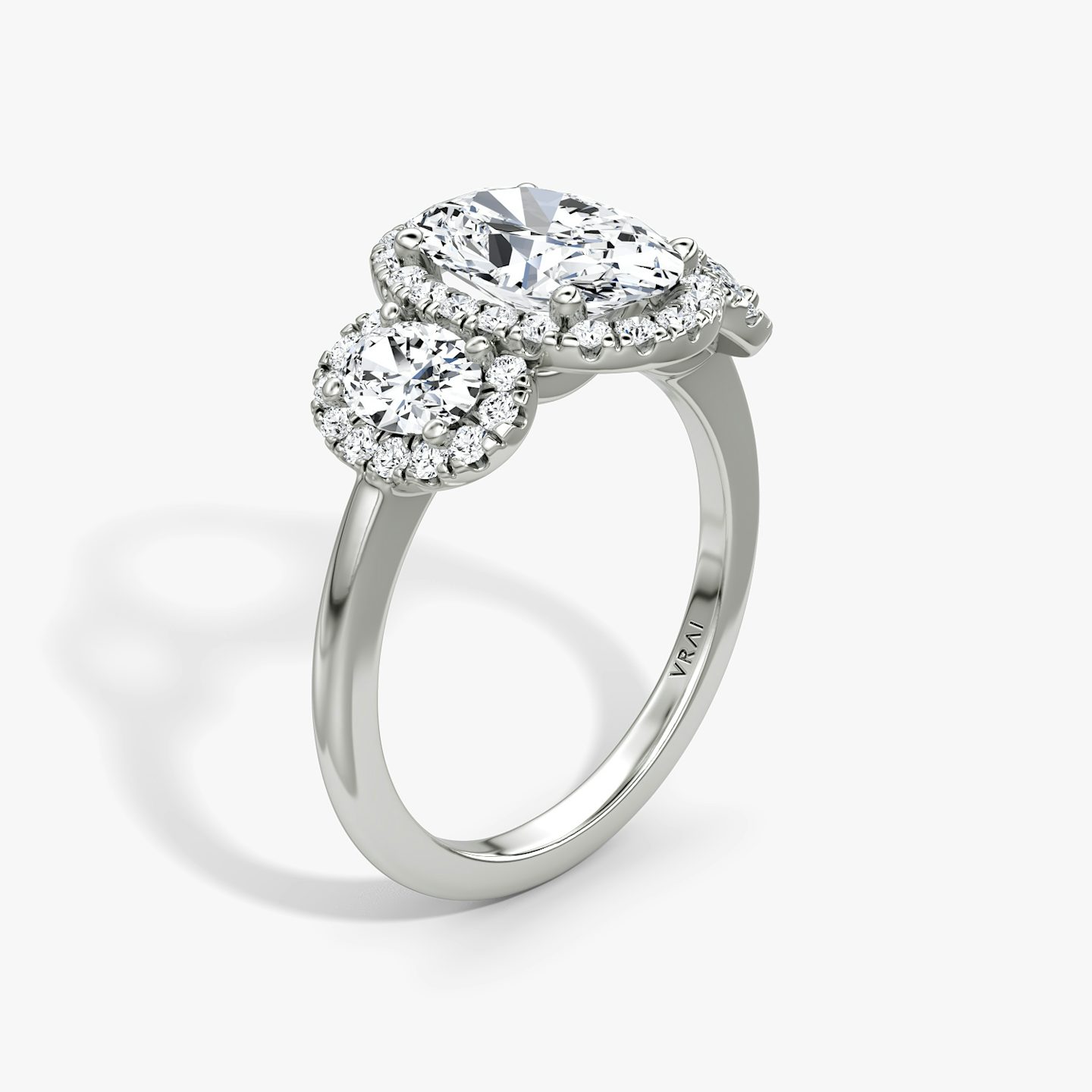 The Three Stone Halo | Oval | 18k | White Gold | bandAccent: Plain | sideStoneCarat: 0.25ct | diamondOrientation: vertical | caratWeight: other