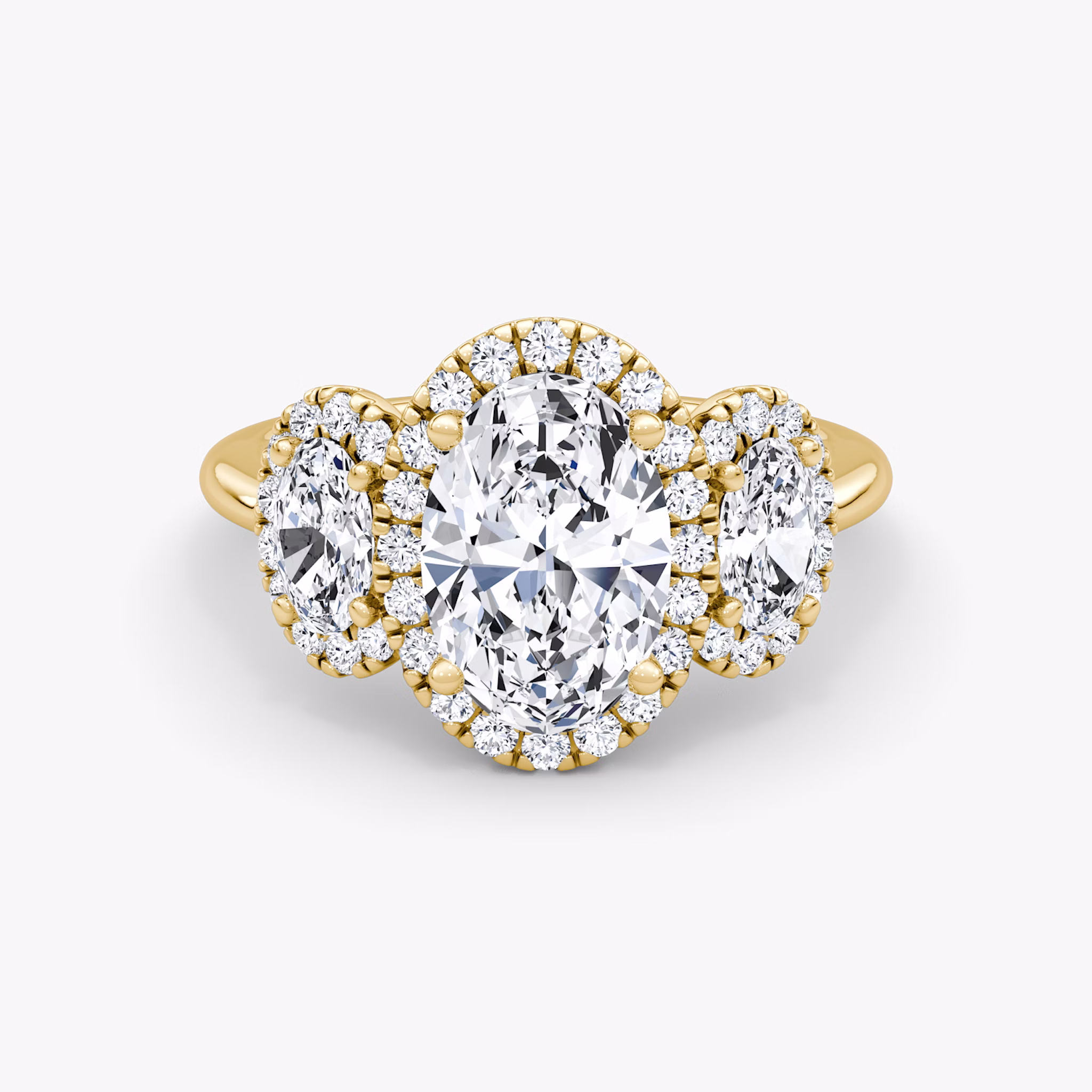 The Three Stone Halo | Oval | 18k | Yellow Gold | bandAccent: Plain | sideStoneCarat: 0.25ct | diamondOrientation: vertical | caratWeight: other