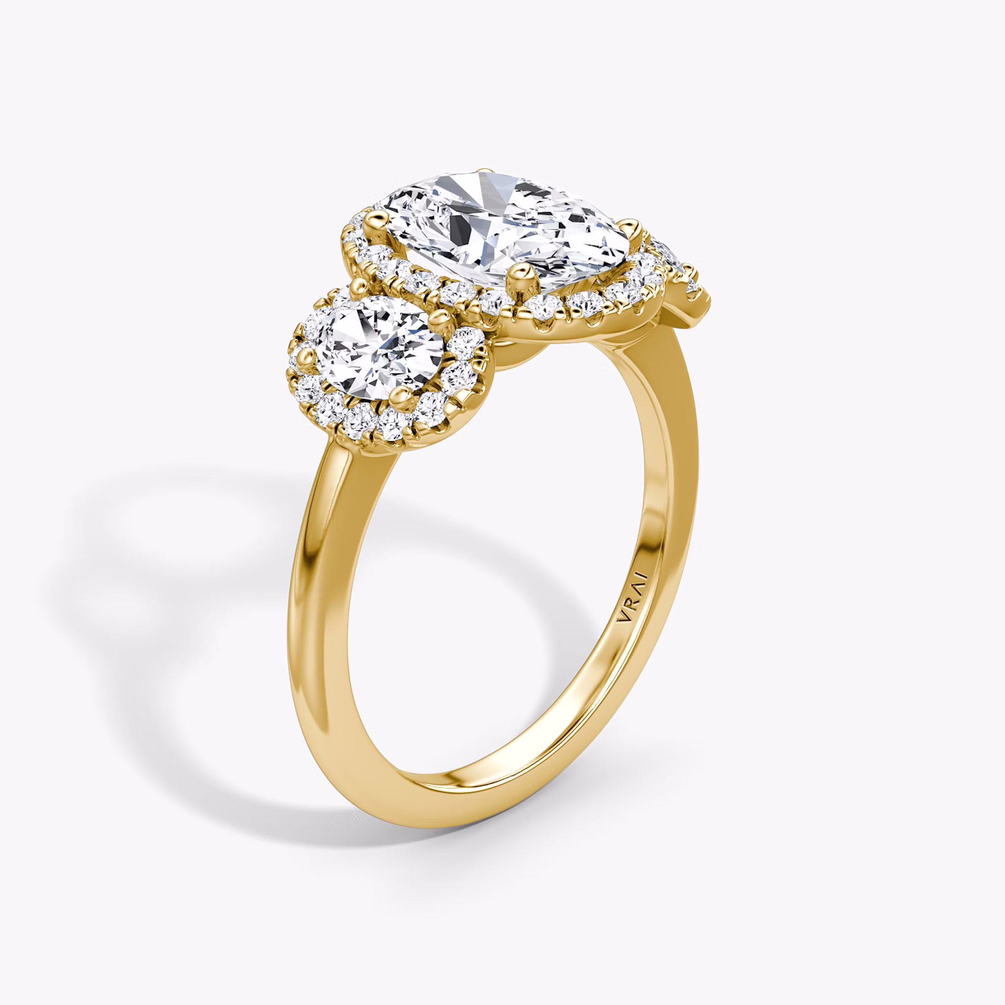 The Three Stone Halo | Oval | 18k | Yellow Gold | bandAccent: Plain | sideStoneCarat: 0.25ct | diamondOrientation: vertical | caratWeight: other