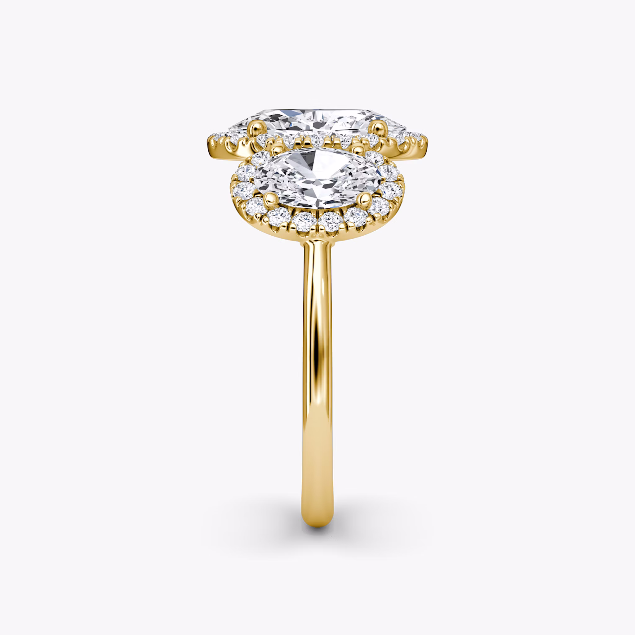 The Three Stone Halo | Oval | 18k | Yellow Gold | bandAccent: Plain | sideStoneCarat: 0.50ct | diamondOrientation: vertical | caratWeight: other