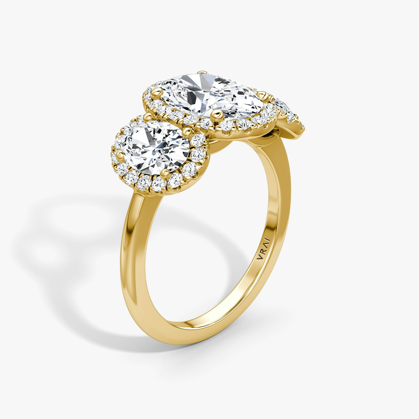 The Three Stone Halo | Oval | 18k | Yellow Gold | bandAccent: Plain | sideStoneCarat: 0.50ct | diamondOrientation: vertical | caratWeight: other