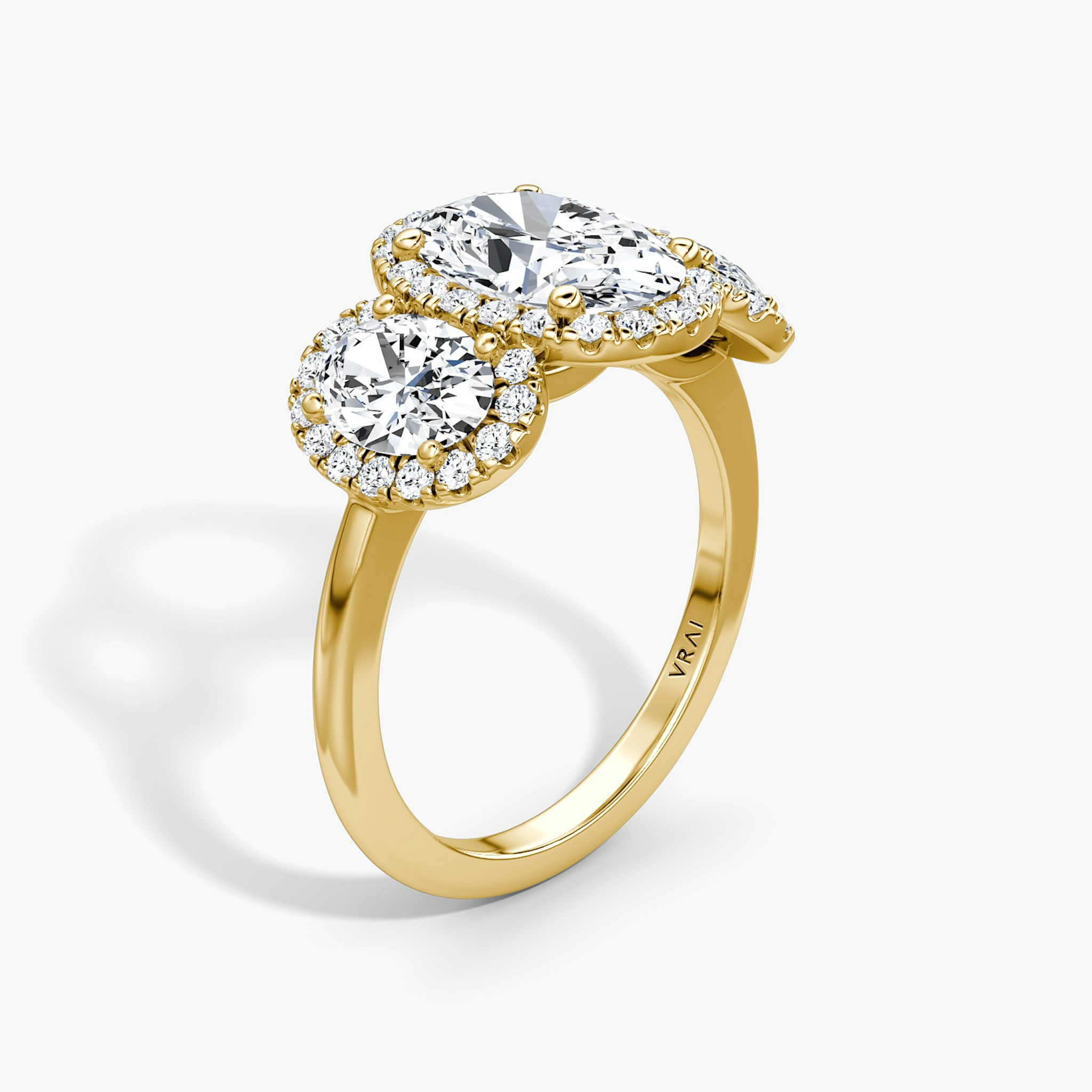 The Three Stone Halo | Oval | 18k | Yellow Gold | bandAccent: Plain | sideStoneCarat: 0.50ct | diamondOrientation: vertical | caratWeight: other