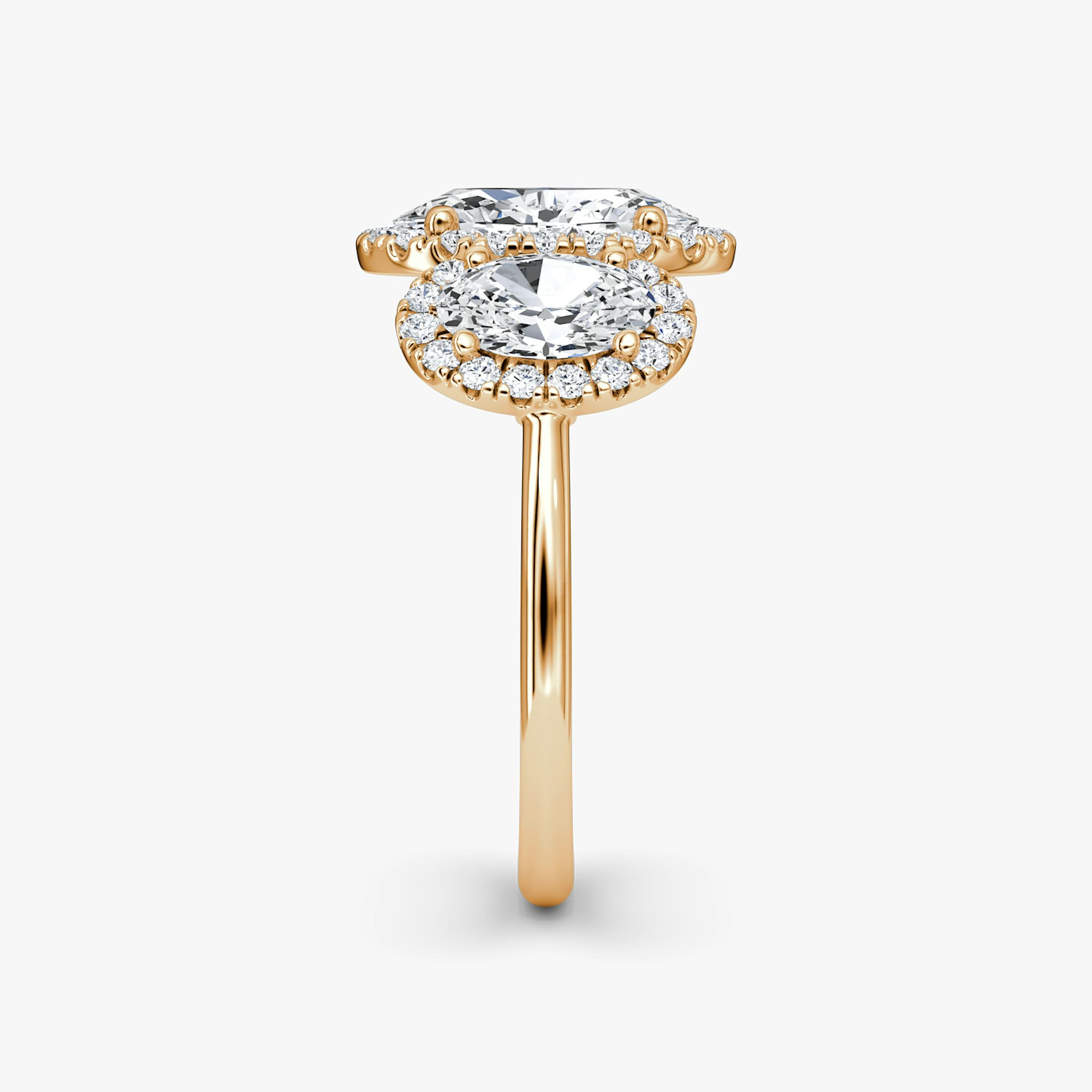 The Three Stone Halo | Oval | 14k | Rose Gold | bandAccent: Plain | sideStoneCarat: 0.50ct | diamondOrientation: vertical | caratWeight: other