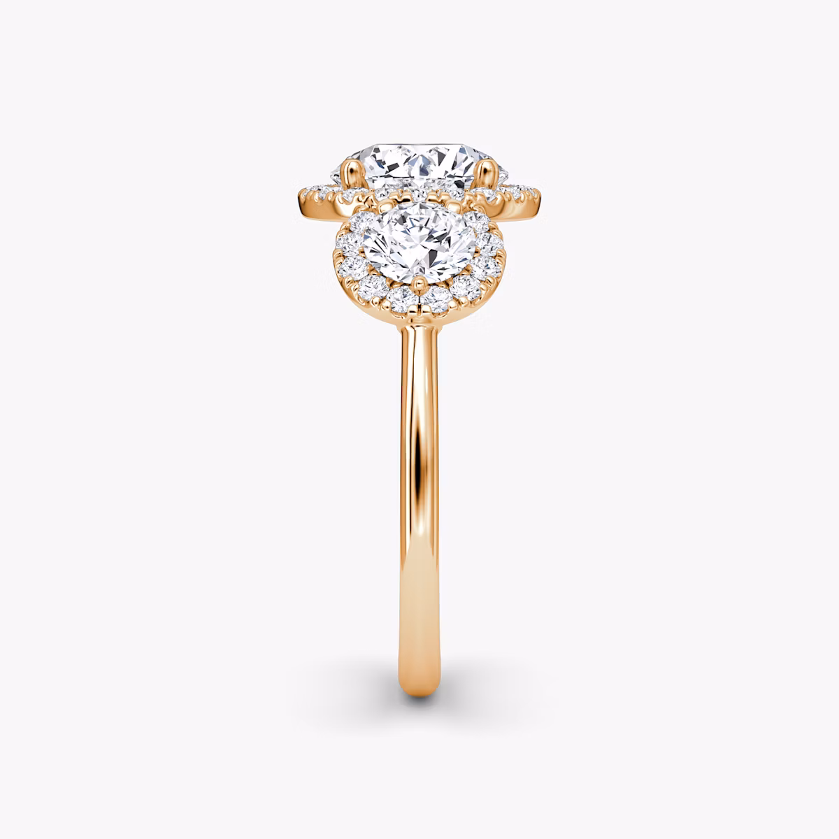 The Three Stone Halo | Round Brilliant | 14k | Rose Gold | bandAccent: Plain | caratWeight: other | sideStoneCarat: 0.25ct | diamondOrientation: vertical