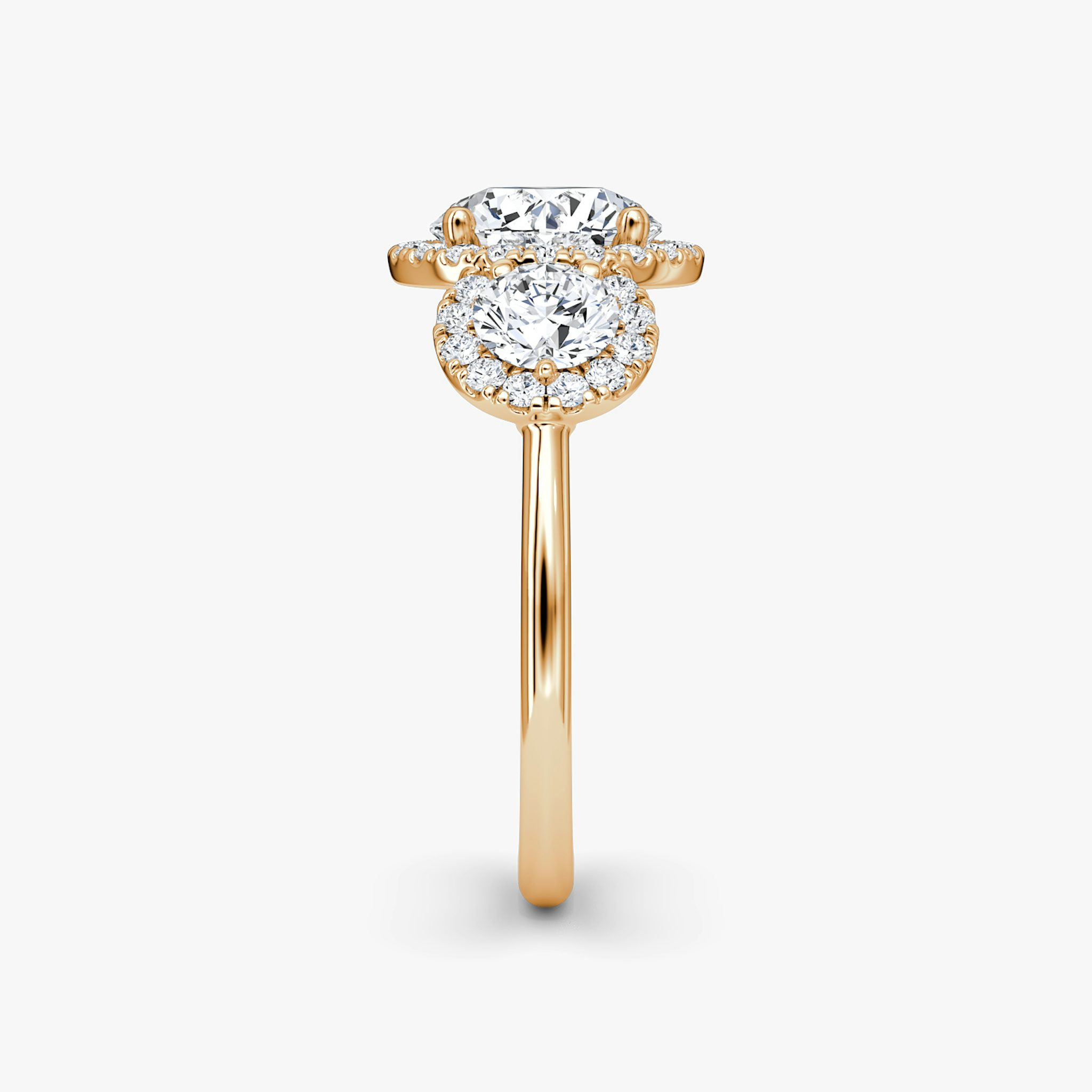 The Three Stone Halo | Round Brilliant | 14k | Rose Gold | bandAccent: Plain | caratWeight: 1.0ct | sideStoneCarat: 0.25ct | diamondOrientation: vertical