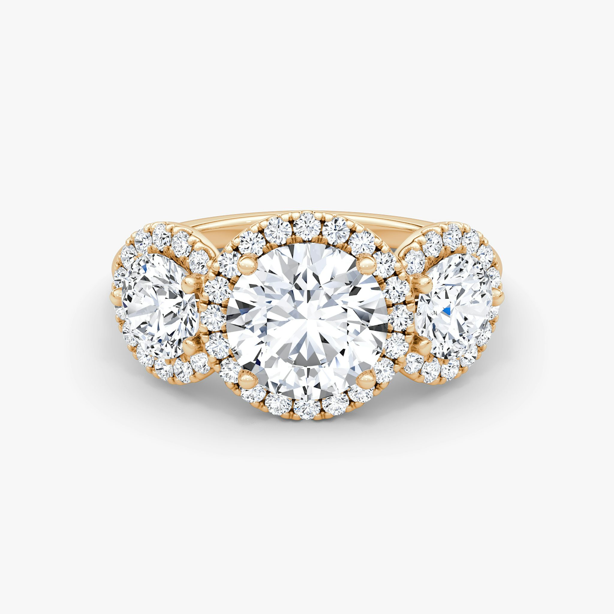 The Three Stone Halo | Round Brilliant | 14k | Rose Gold | bandAccent: Plain | caratWeight: other | sideStoneCarat: 0.50ct | diamondOrientation: vertical