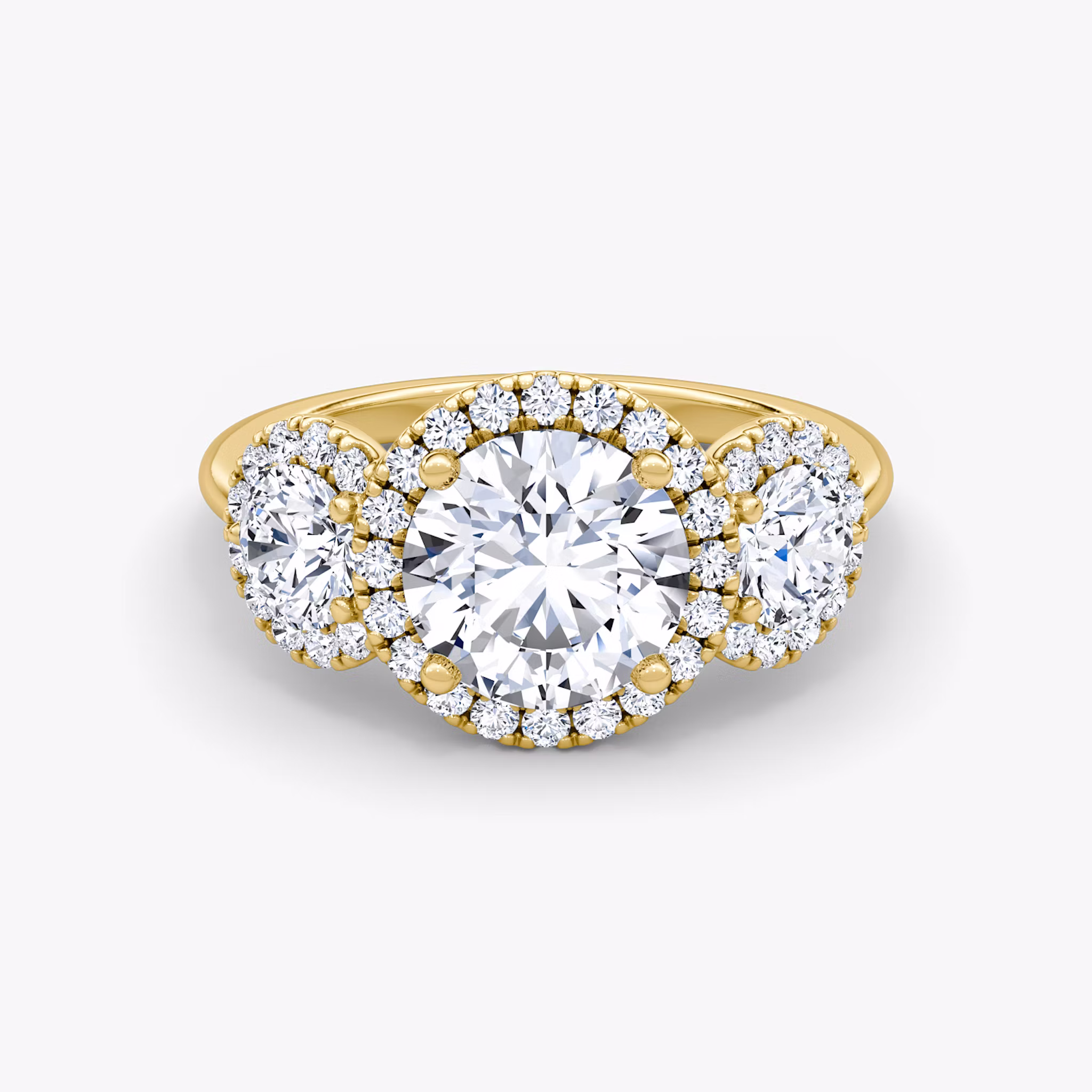 The Three Stone Halo Round Brilliant | Yellow Gold
