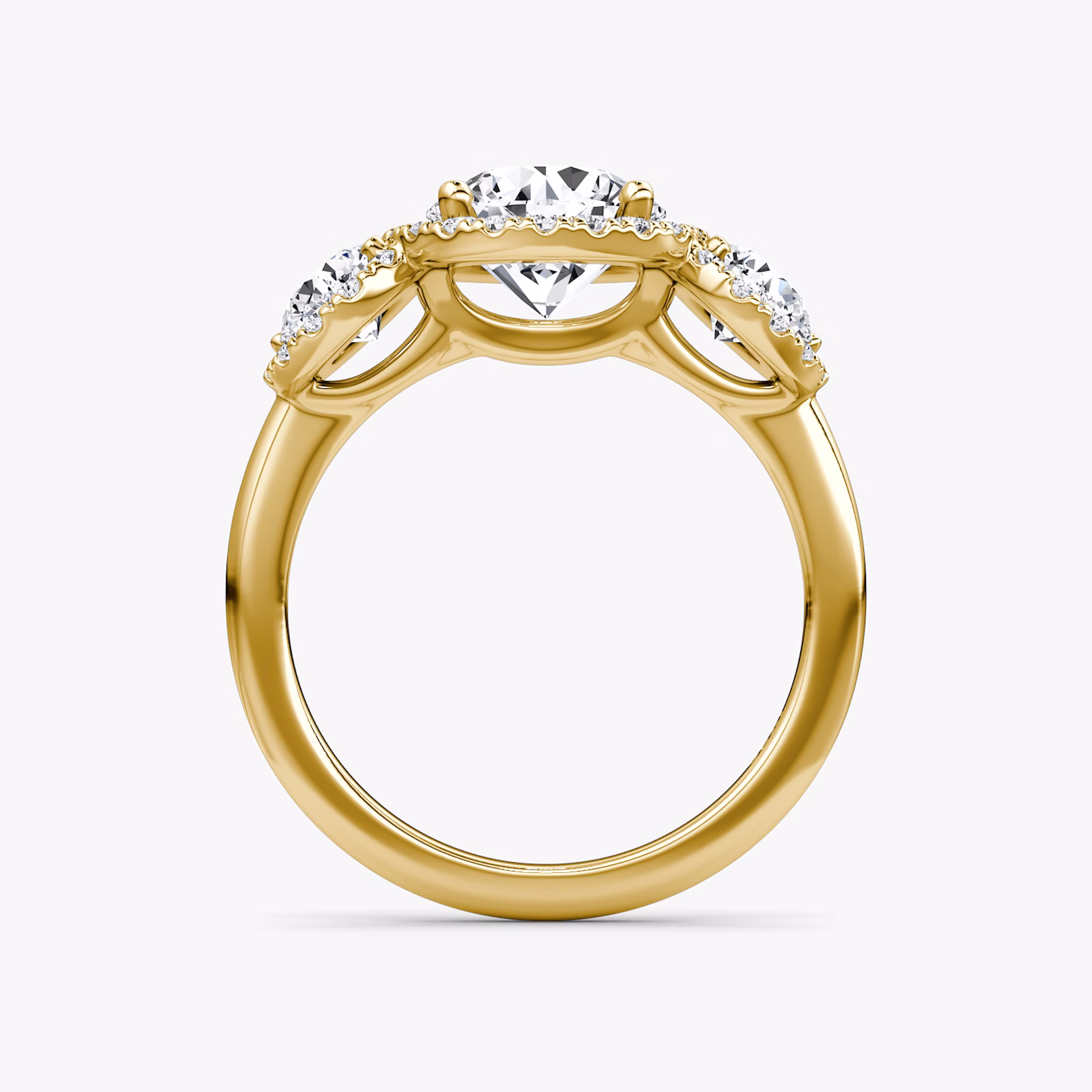 Anillo de compromiso Three Stone Halo | Brillante | 18k | Oro amarillo | bandAccent: Simple | caratWeight: other | sideStoneCarat: 0.25ct | diamondOrientation: vertical