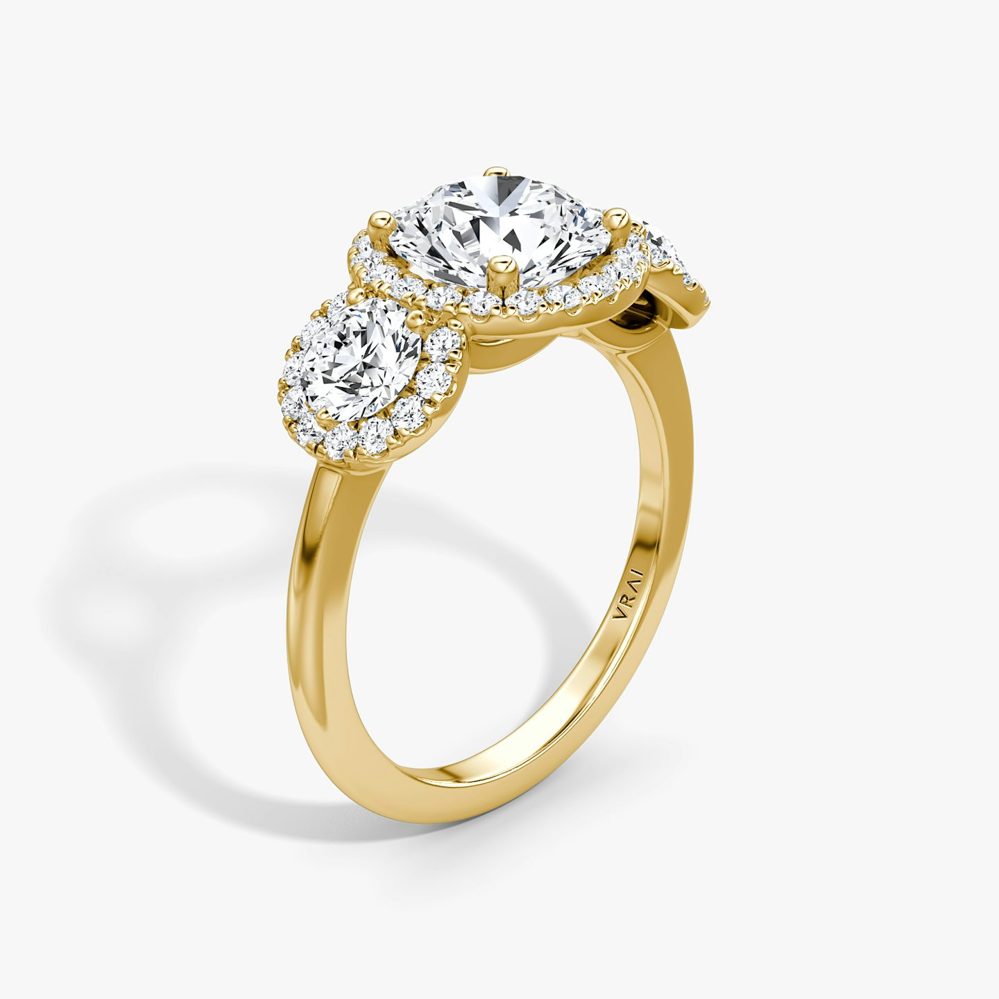 The Three Stone Halo | Round Brilliant | 18k | Yellow Gold | bandAccent: Plain | caratWeight: 1.5ct | sideStoneCarat: 0.25ct | diamondOrientation: vertical