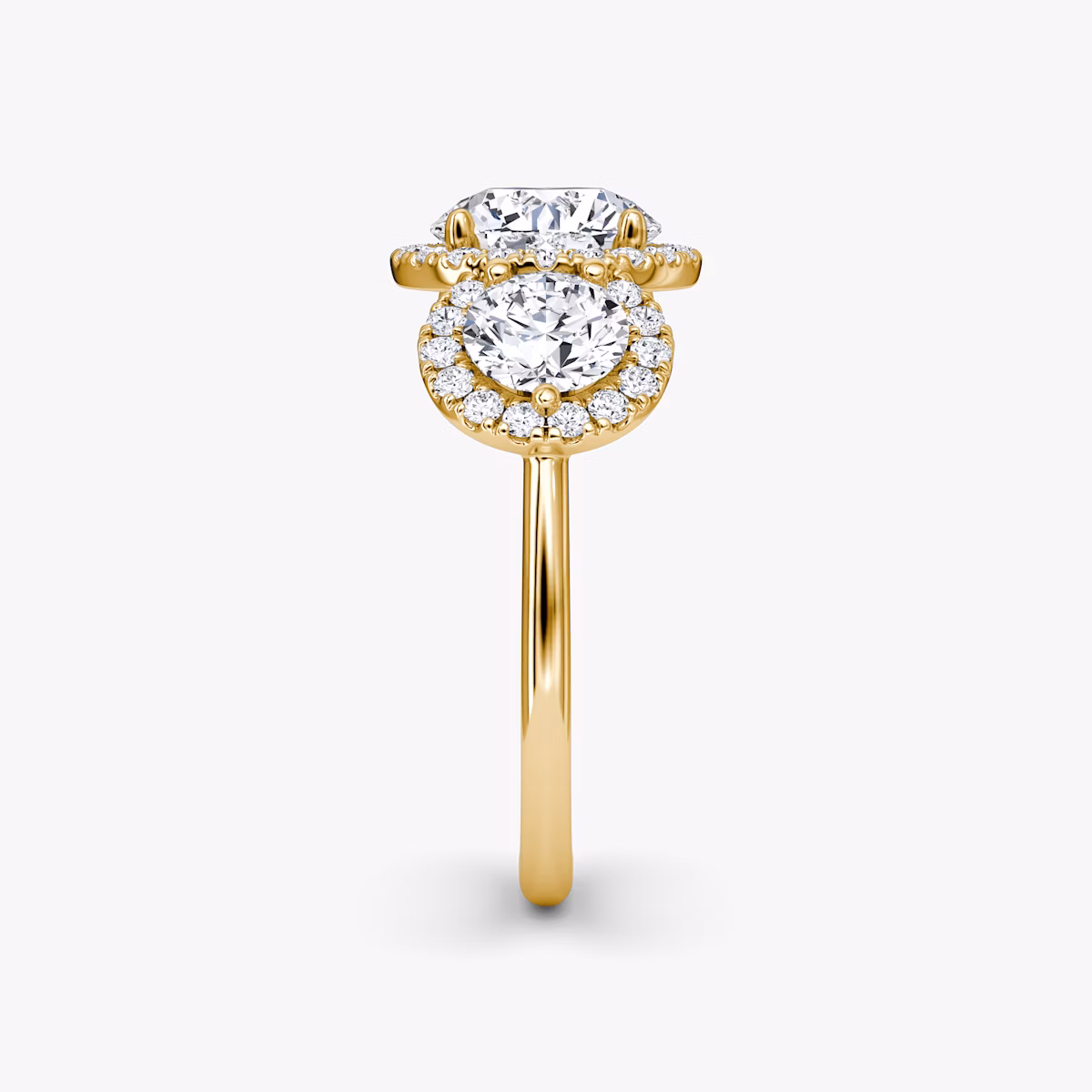 The Three Stone Halo | Round Brilliant | 18k | Yellow Gold | bandAccent: Plain | caratWeight: other | sideStoneCarat: 0.50ct | diamondOrientation: vertical