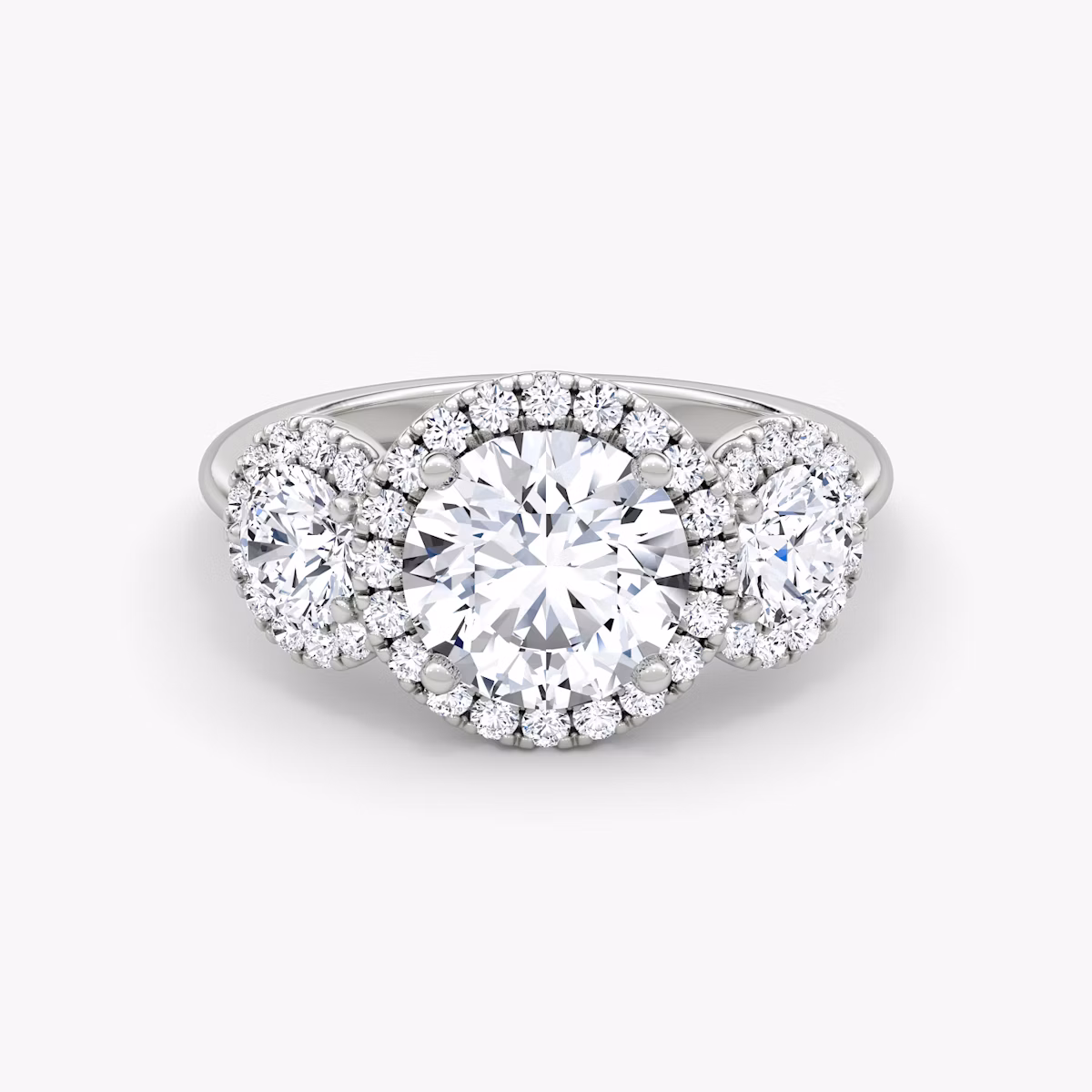 three stone halo ring round plain platinum