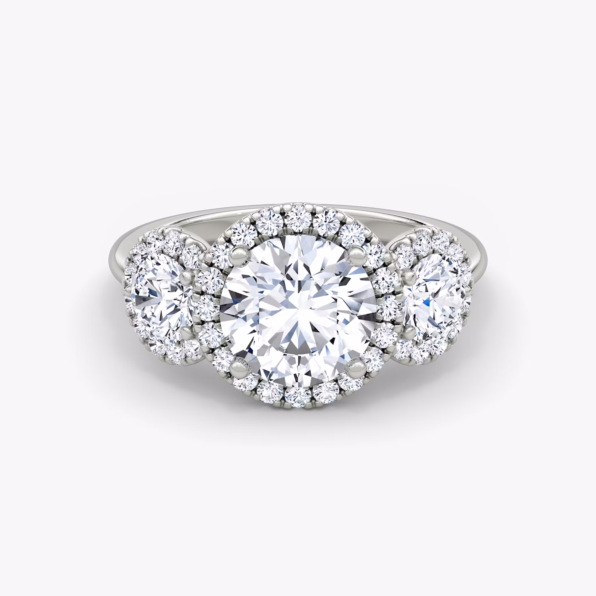 The Three Stone Halo Round Brilliant | Platinum