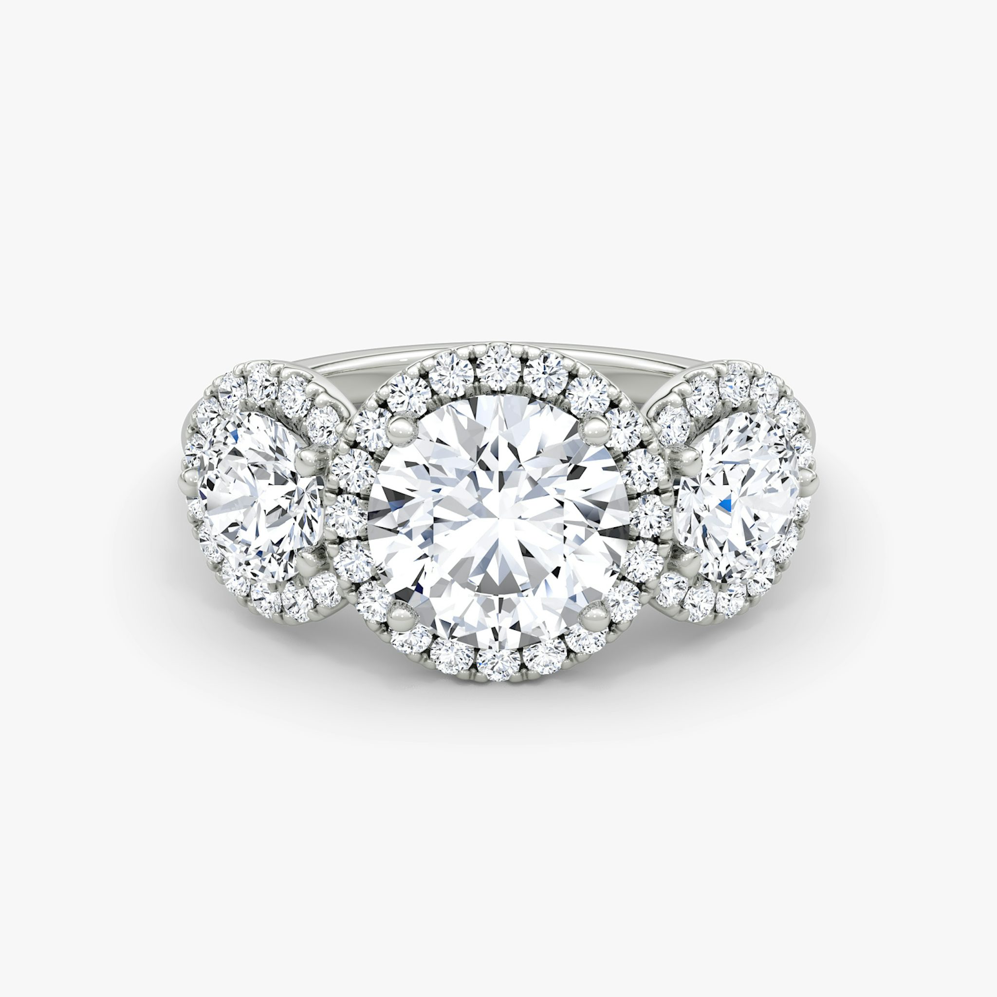Anillo de compromiso Three Stone Halo | Brillante | Platino | bandAccent: Simple | caratWeight: other | sideStoneCarat: 0.50ct | diamondOrientation: vertical