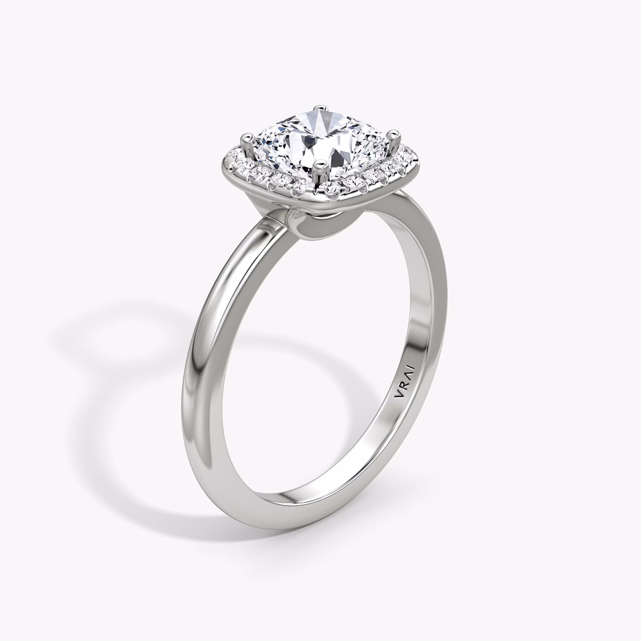 The Halo | Cushion | Platinum | bandAccent: Plain | haloSize: original | diamondOrientation: vertical | caratWeight: other