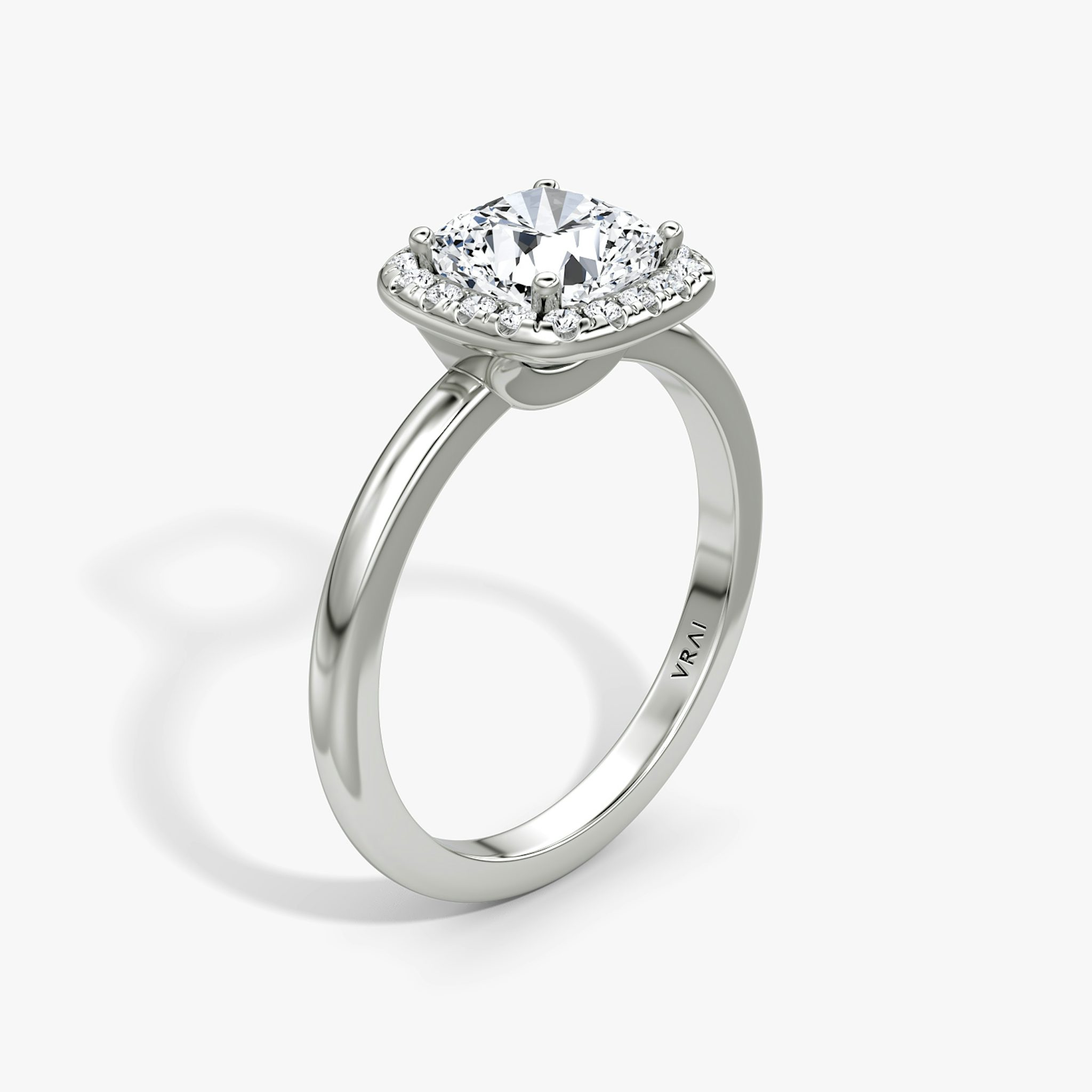The Halo | Cushion | Platinum | bandAccent: Plain | haloSize: original | diamondOrientation: vertical | caratWeight: other